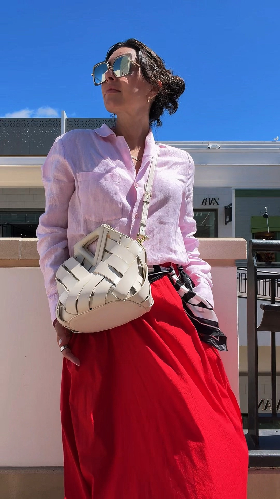 A pop of red makes every outfit better ❤️ Paired with a lightweight linen shirt and my ALLSANTAELLA woven leather bag for an effortless summer look.#LTKsummer #ALLSANTAELLA #LeatherBag #SummerStyle #EffortlessChic #LinenShirt #RedSkirtStyle

#LTKootd #LTKootd #LTKvlog #LTKOver40