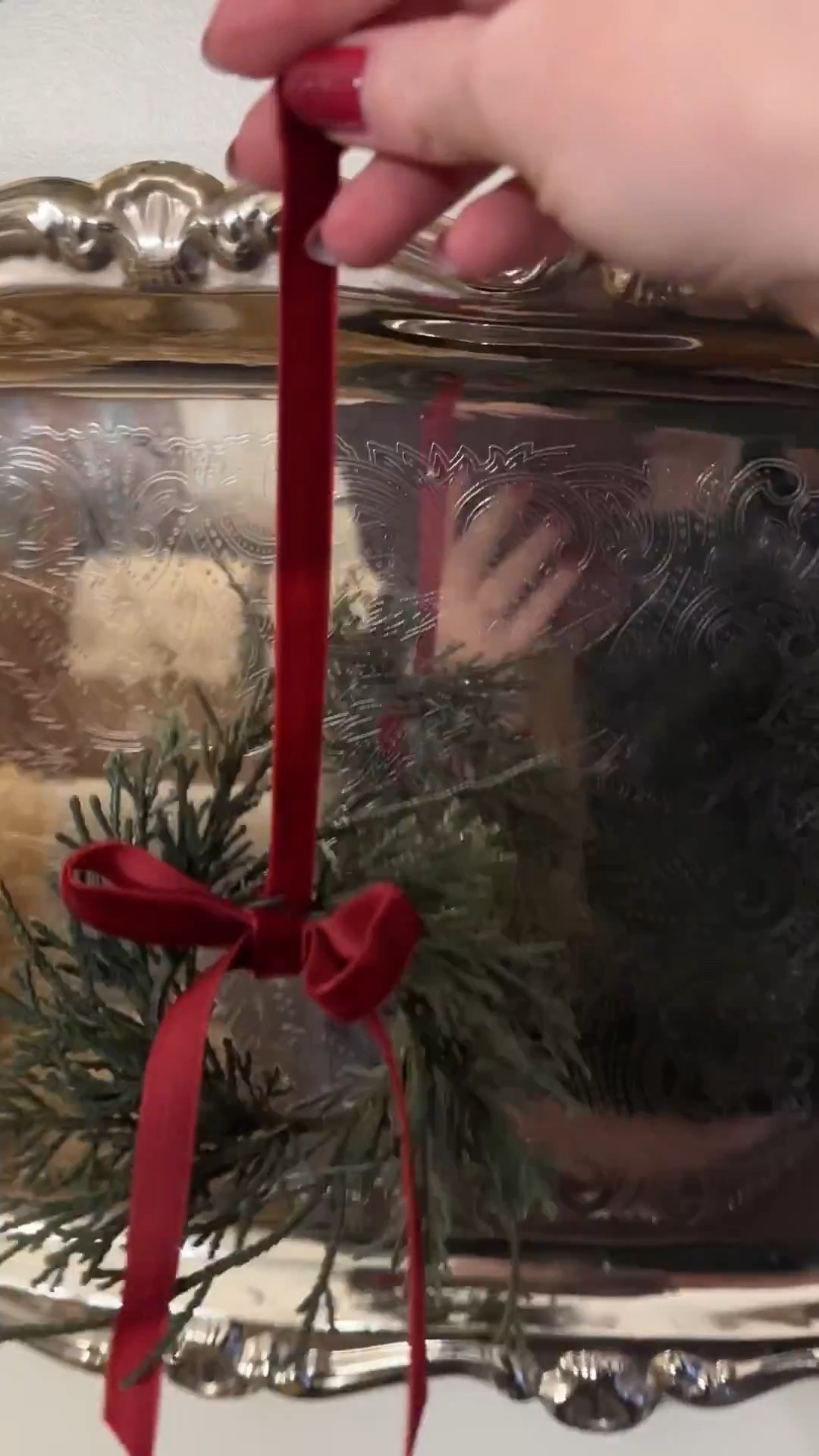 Silver plates are all polished and dressed up for the holidays with greenery and bows! 😍

#LTKSeasonal #LTKHome #LTKHoliday