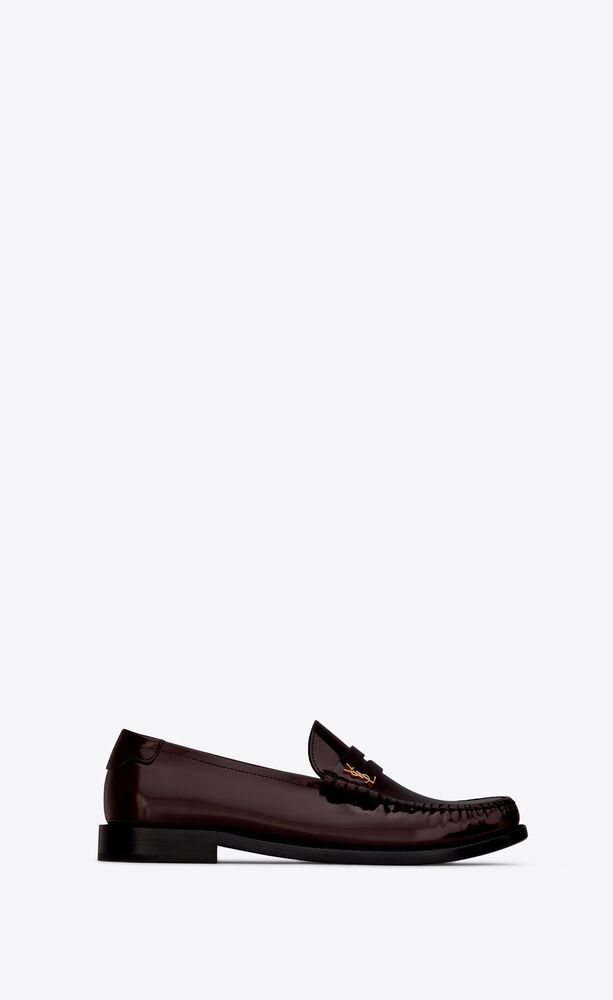 Penny loafers with Saint Laurent embossed back tab and saddle decorated with metal YSL initials o... | Saint Laurent Inc. (Global)