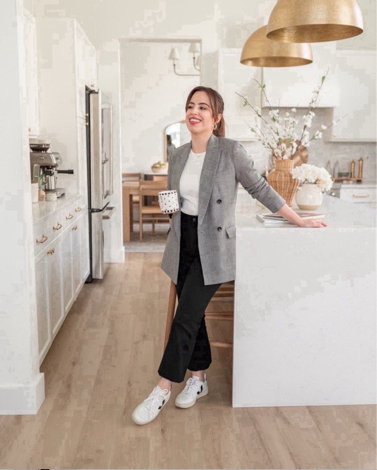 Step into the office with a look that’s both polished and comfortable! Styled this classic black pants with a crisp white top, a chic blazer, and my favorite white sneakers. The best part? You can easily transition into the weekend by just losing the blazer for a casual, ready-to-go vibe.

corporate wear, business casual, office wardrobe, workwear, polished look, dainty accessories, veja sneakers, girl boss

#LTKootd #LTKSeasonal #LTKU