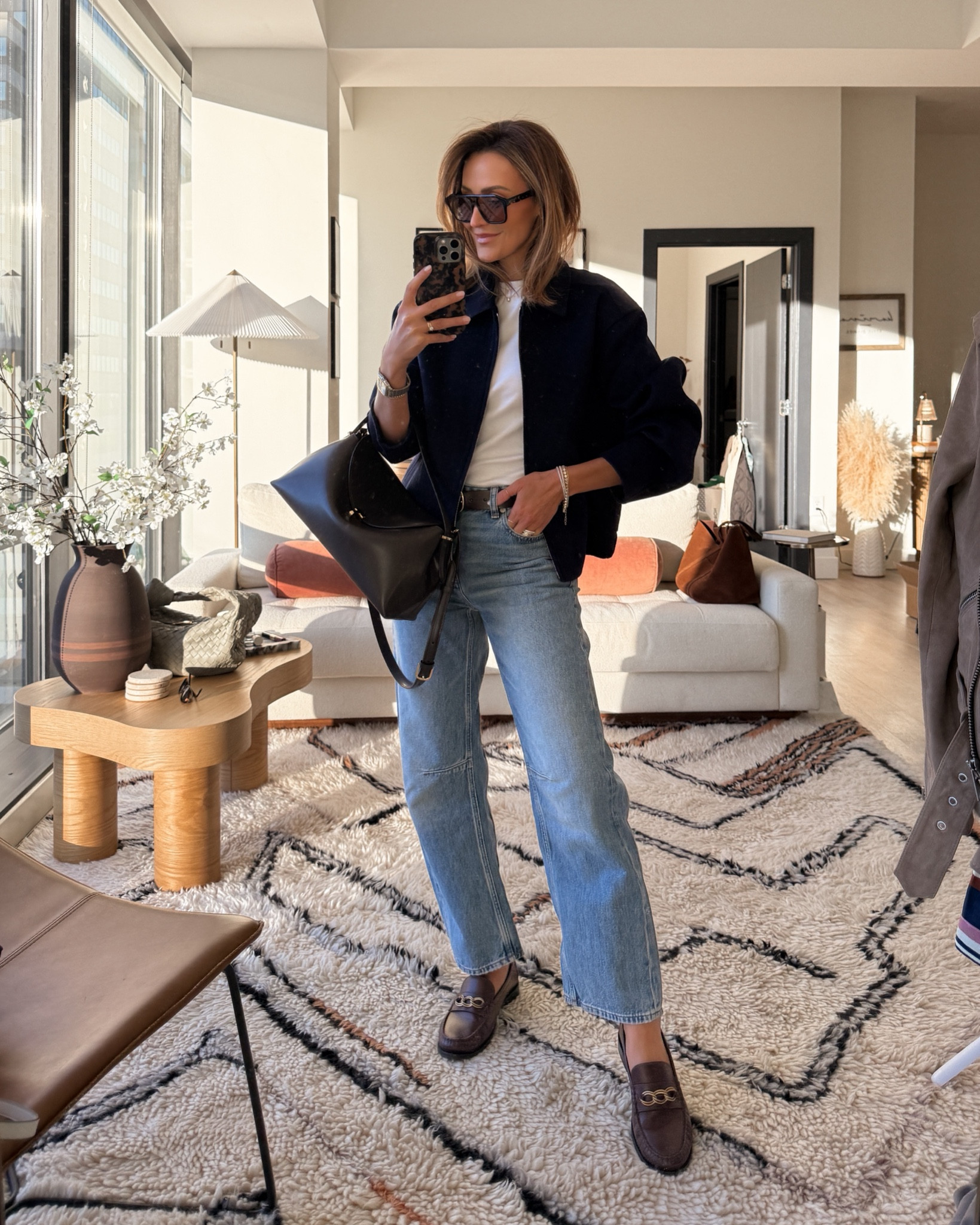 A casual yet chic spring transition outfit! While this look totally works for spring weather, it could also be a good go-to winter outfit if you live somewhere with mild temps. This navy blue jacket is such a great staple to add to your wardrobe since it’s versatile and timeless. I’m also loving these darted barrel leg jeans, which are on the more minimalist side of things (perfect if you’re new to the style.) Add some leather loafers and you’ll be set for day to night wear! 

p.s. This would also make for a cute work outfit! 

#LTKItBag #LTKStyleTip #LTKWorkwear