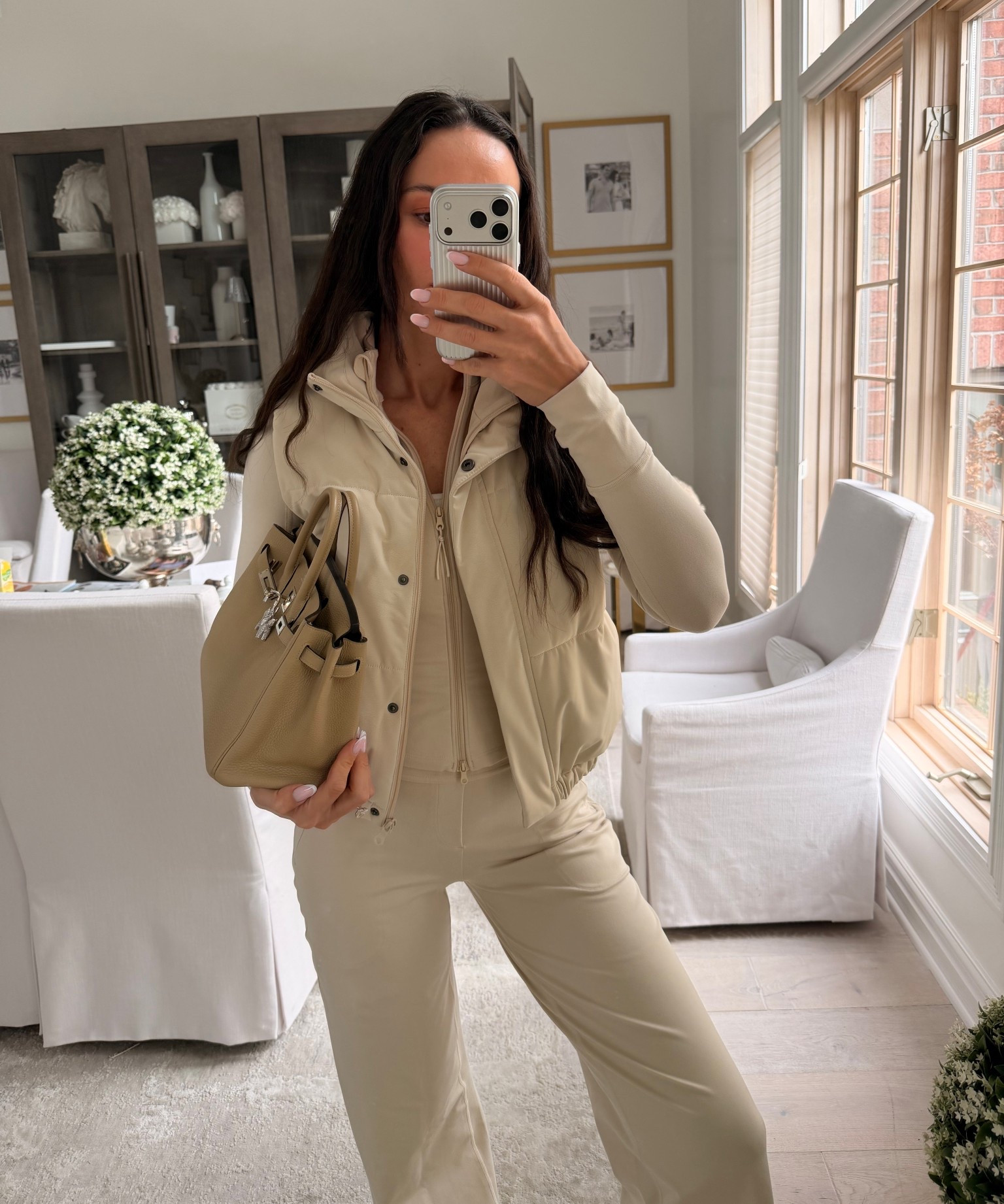 Outfit 40% off this week. Wearing pants and top in XS. Vest no longer available 