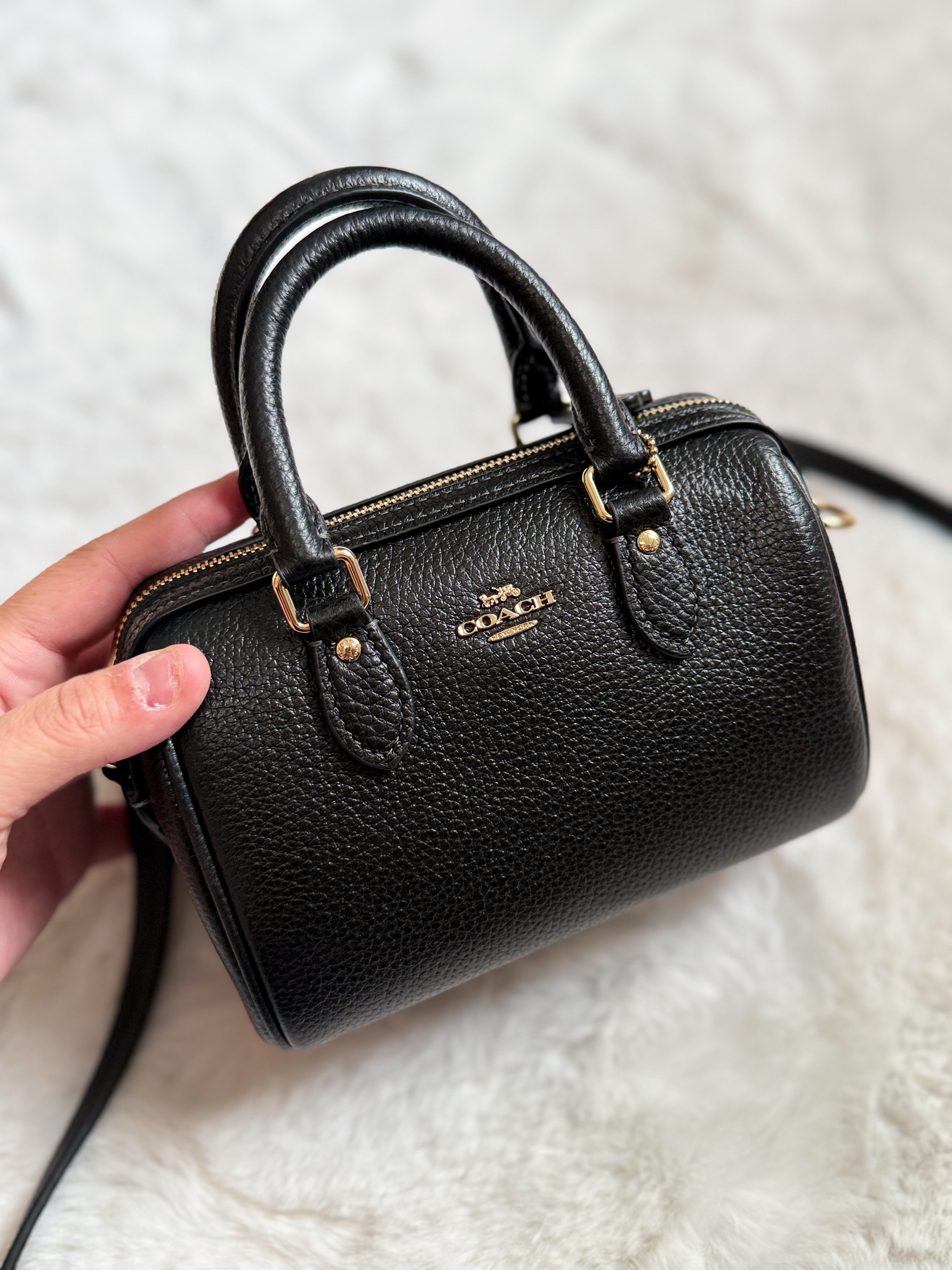 The Coach Mini Rowan crossbody bag is the perfect throw on and go mom bag or travel bag! It holds more than you would think, including my iPhone 16 Pro Max. This is a Coach Outlet bag so the leather is gorgeous and the price point is even better!  

 #LTKmomlife #LTKOver40 #LTKMidsize