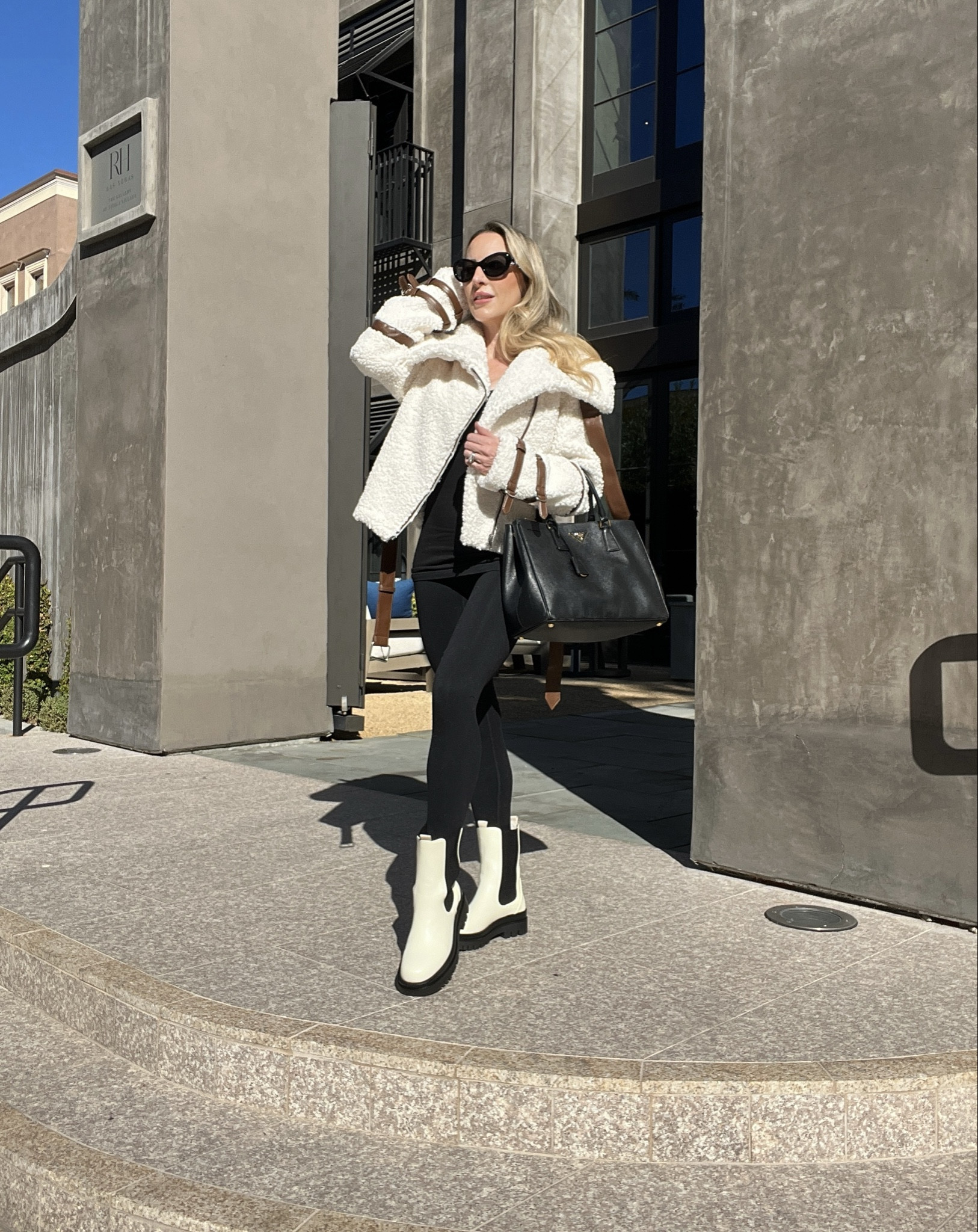 This cozy cream Sherpa jacket has had so much wear over the last 2 winters. It’s still in stock and comes in more colors plus the pockets fit your iPhone and keys. Linking some similar flat cream chelsea boots and the same black Prada tote bag I’ve been using for over a decade! One to add to your Christmas gift wish list for sure.  

#LTKitbag #LTKstyletip #LTKGiftGuide
