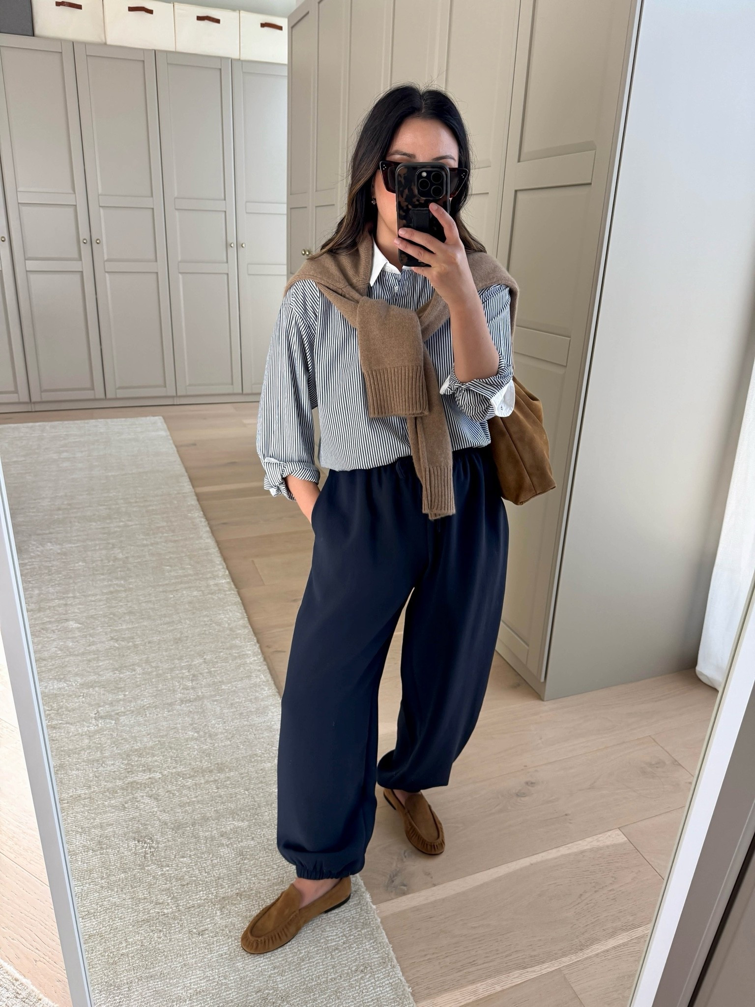 Aritzia Balloon pants in the same material as the Lodge. The Lodge don’t fit me, so these are the next best thing! Petite-friendly, so comfy!

J.crew shirt 4 - old
Aritzia Balloon pants xs
Vince loafers 5
Quince sweater xs
Liffner shoulder bag -‘old
Celine sunglasses 
Electric picks earrings

#LTKPetite #LTKmomlife #LTKWorkwear