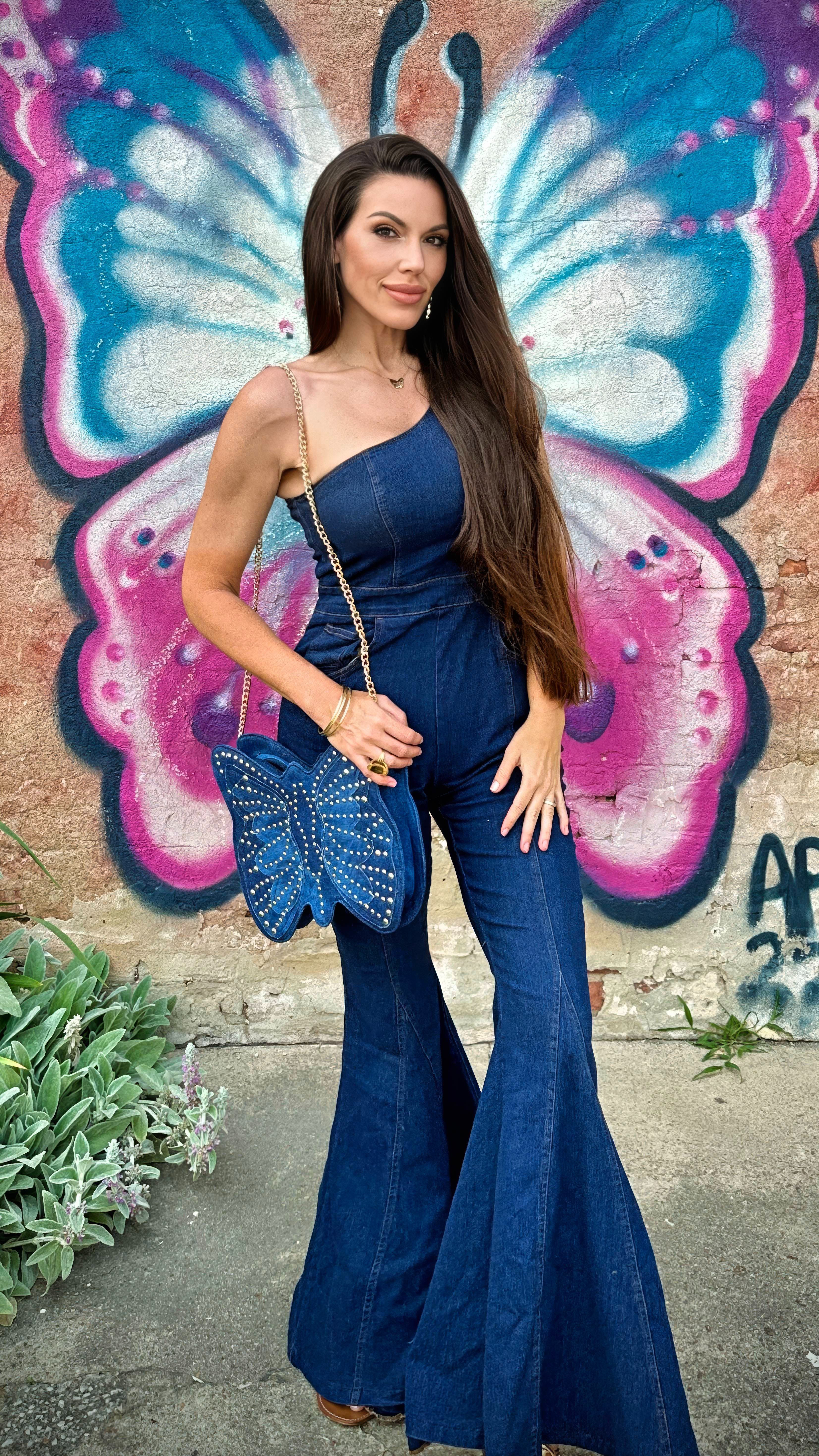 🦋 Denim moment activated.
This one-shoulder jumpsuit + butterfly bag are both from @FashionNova, but I’ve linked similar pieces from Amazon you can grab fast.

Flared legs, bold accessories, and butterfly energy all summer long. 💙✨ 

 #LTKSummerEdit #LTKSeasonal #LTKOver40