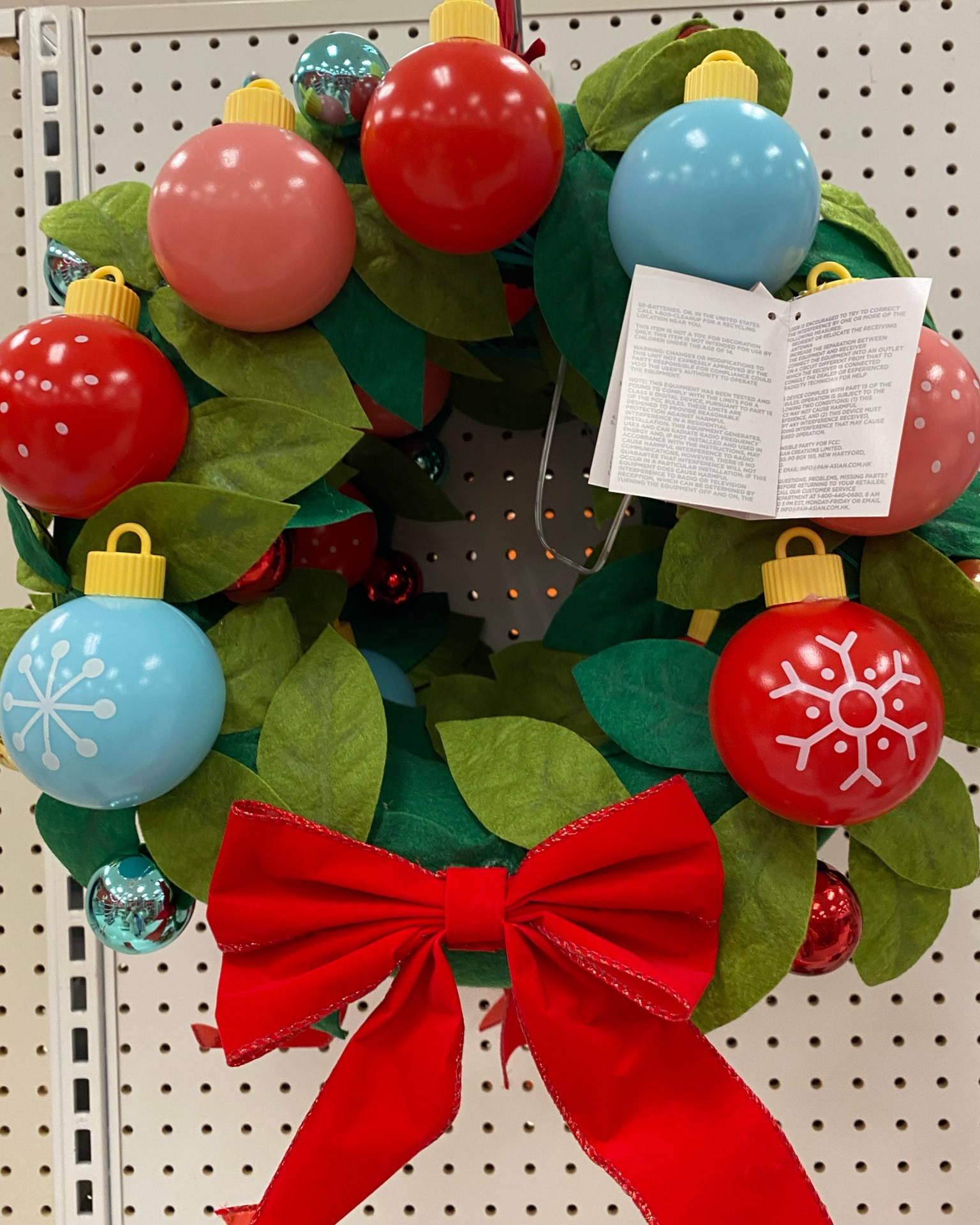 The Pre-Lit Battery-Operated Christmas Novelty Wreath from Wondershop™ adds fun light and sound to your holiday decor. This novelty wreath features green felt leaves, bulb ornaments that light up and a large red bow. Great for displaying on a wall or door, this festive Christmas wreath plays the tunes “Let It Snow,” “Jingle Bells” and “We Wish You A Merry Christmas.” 

14.5" Pre-lit Battery Operated Musical Christmas Novelty Wreath Green - Wondershop™

16.5"x14" Reversible Gingerbread House to Polka Dot Christmas Novelty Plush Pillow Brown/Blue - Wondershop™ Target

1'6"x2'6" 'Welcome' Wreath Flocked Coir Christmas Doormat Red/Green - Wondershop™

25ct LED C9 Faceted Christmas String Lights Multicolor with Green Wire - Wondershop™

60ct LED Faceted Sphere Christmas String Lights Multicolor with Green Wire - Wondershop™

3ct/28in Candy Cane Christmas Path Lights - Wondershop™

1'6"x2'6" 'Let It Snow' Coir Christmas Doormat Blue/White - Wondershop™

3' Unlit Downswept Alberta Spruce Mini Artificial Christmas Tree with Burlap Base - Wondershop™

4pc Faceted C9 Big Bulb Christmas Pathway Light Multicolor - Wondershop™

27.5" Incandescent Green Tinsel Dinosaur with Gift Christmas Novelty Sculpture Light Clear - Wondershop™

16" LED Hanging Wood Reindeer Head with Greenery Christmas Novelty Silhouette Light Warm White - Wondershop™

36" Incandescent Fabric Snowman Christmas Novelty Sculpture Light White - Wondershop™

2pc 3' Pre-Lit Virginia Pine Potted Mini Artificial Christmas Tree Clear Lights - Wondershop™

3ct Grapevine Gift Box Christmas Novelty Sculpture Light - Wondershop™

1'6"x2'6" Snowflake Coir Christmas Doormat Red - Wondershop™

#LTKkids #LTKhome #LTKHoliday
