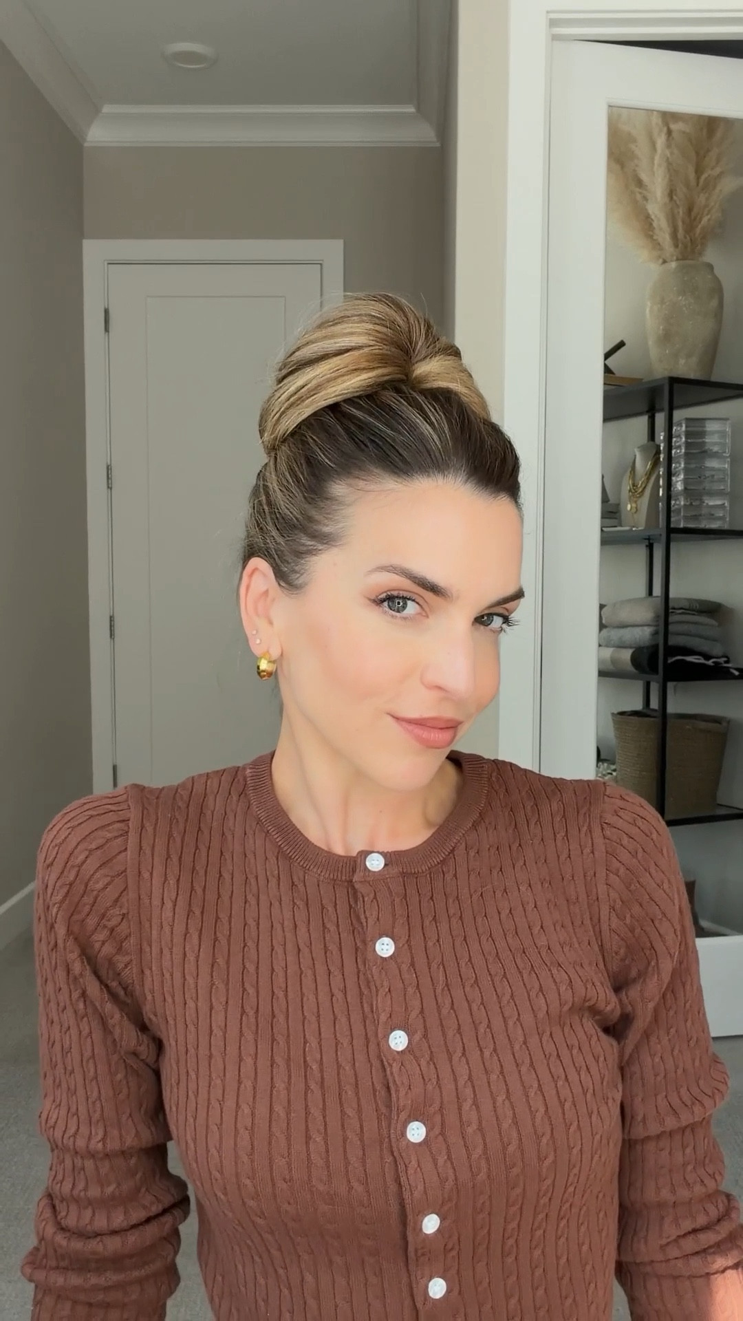 High bun volume hack!

Pull your hair into a high ponytail and secure it with a hair tie. Slip a stretchy hair tie onto one side of a small claw clip. Flip your ponytail forward and clip the claw clip over the top of it. Fold your ponytail back over the clip to form a bun and hide the clip. Twist the attached hair tie once and wrap it around the bun to secure. Gently pinch and pull to add fullness and create that effortless, lived-in look!

#LTKFindsUnder50 #LTKSeasonal #LTKBeauty