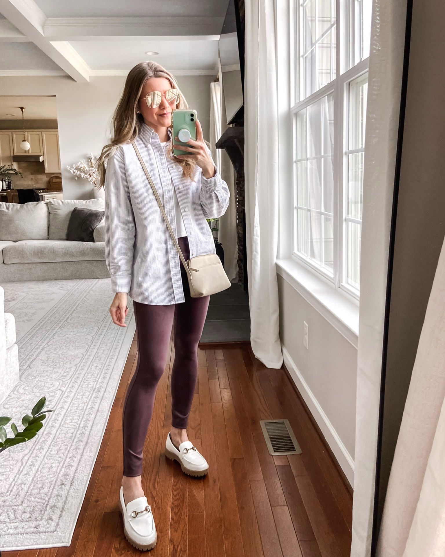 Brown faux leather leggings (runs big, I sized down one size). Vintage menswear striped shirt.

#LTKstyletip #LTKfindsunder50