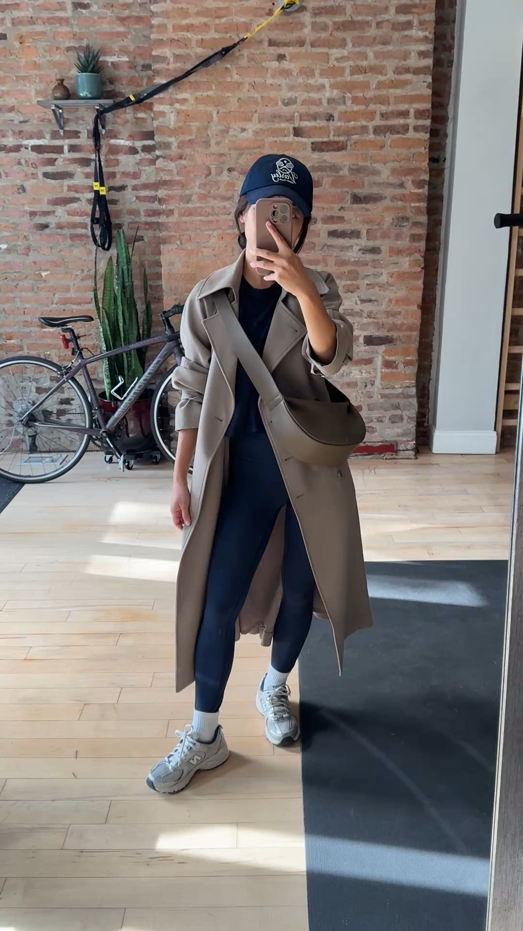 Outfit this AM from School drop off to the gym. Add a long trench and leather bag to make a workout look feel more chic 

• Oak + Fort trench coat xxs - use code JEANTRENCH for 15% off. Very loose fit and long, hits past midi length on me (5ft) but I wear this all the time. The material has a nice weight and drapes well, and the style is effortless.

• lululemon tee in true navy size 4 - I love these lightweight tees for everyday wear, gym workouts, and layering. Size up for a waist length that isn’t too cropped

• lululemon align leggings 23” in true navy size 2

• New Balance 530 - a big kids 4 = womens 5.5/6. These are very comfy and have been great for casual to the gym to travel.

• Amazon crossbody bag. Look for less for COS which is several times the price. Good quality pebbled leather , good capacity and comfy wide strap

• Varley cap

• kids socks since they fit smaller 

Travel airport outfit, easy mom style, athleisure

#LTKTravel #LTKActive #LTKPetite