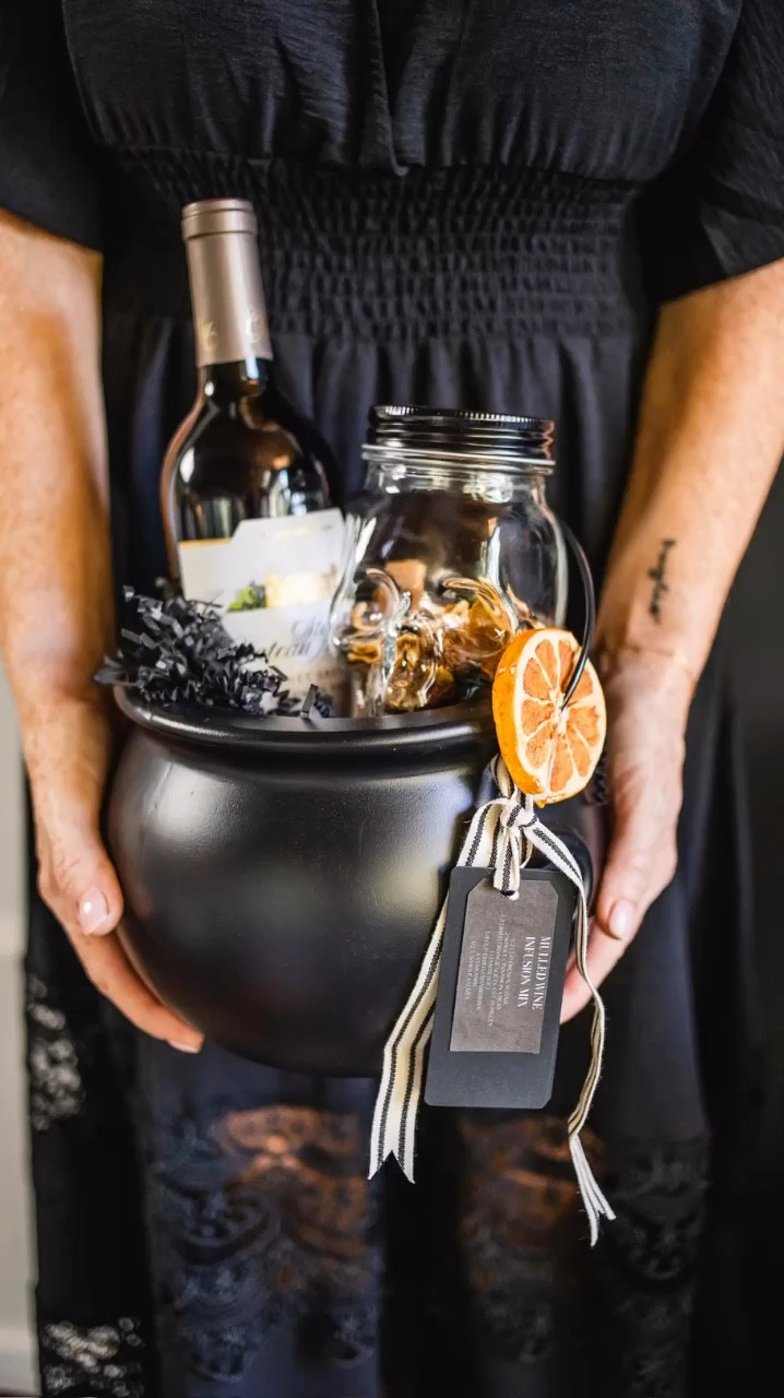 Looking for the perfect Halloween hostess gift? I’ve created a fun DIY set featuring a mulled wine mix, a bottle of wine, and adorable skeleton glasses, all wrapped up in black crinkles and presented in a spooky black cauldron. It’s the ultimate festive gift to bring some spooky charm to any party. Shop everything you need to recreate this look below! #HalloweenHostessGift #DIYGiftIdeas #HalloweenDecor #MulledWine #HalloweenParty #GiftGivingSeason #LTKHoliday #LTKHome

#LTKParties #LTKHalloween #LTKSeasonal