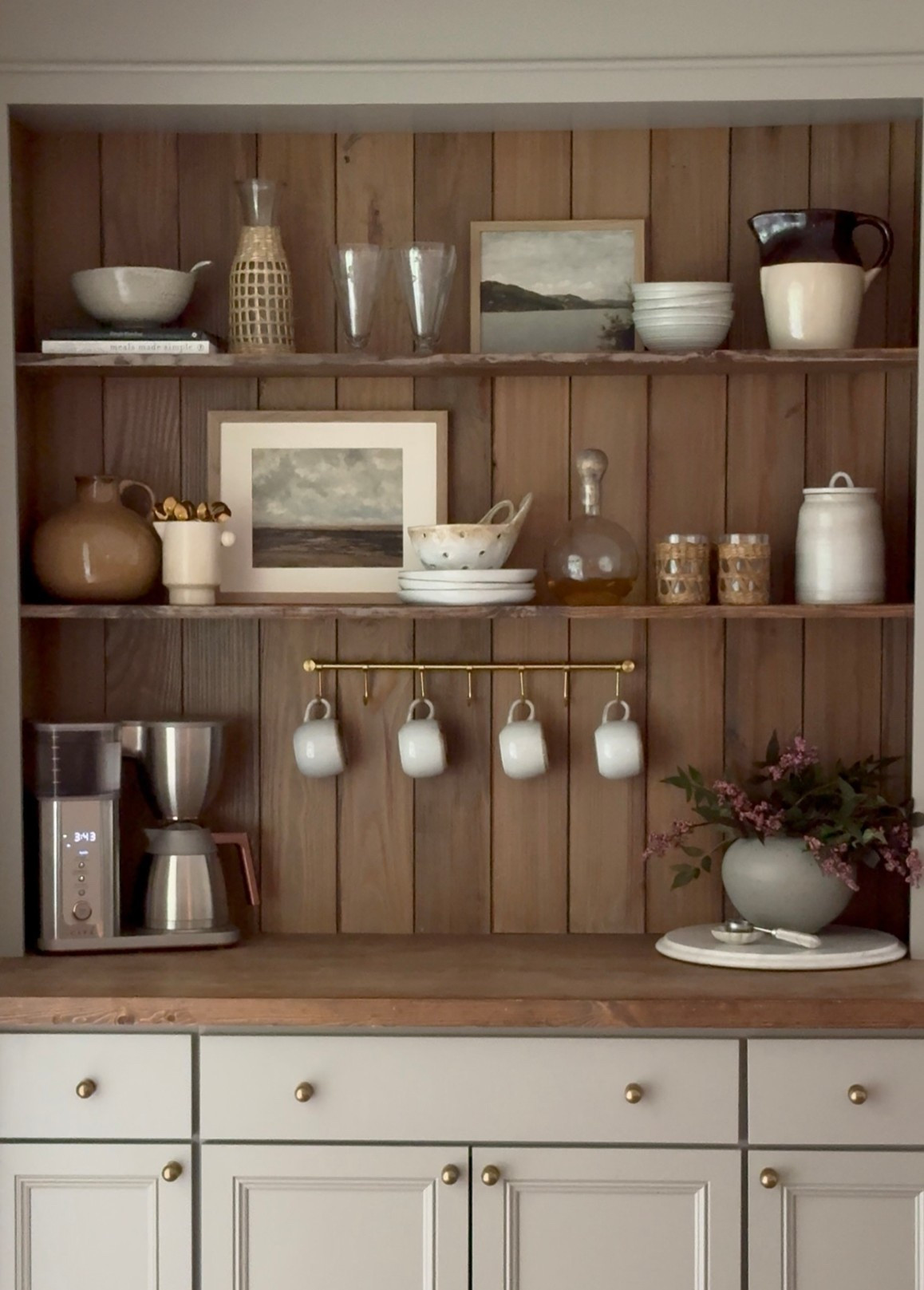 Coffee bar | kitchen utility rail | coffee bar styling | stoneware | pottery | shelf styling | kitchen shelf styling | vintage pitcher | coffee spoons | mug rail | pitcher | coordinating art prints | gallery frame 

#LTKHome #LTKFindsUnder50 #LTKFindsUnder100