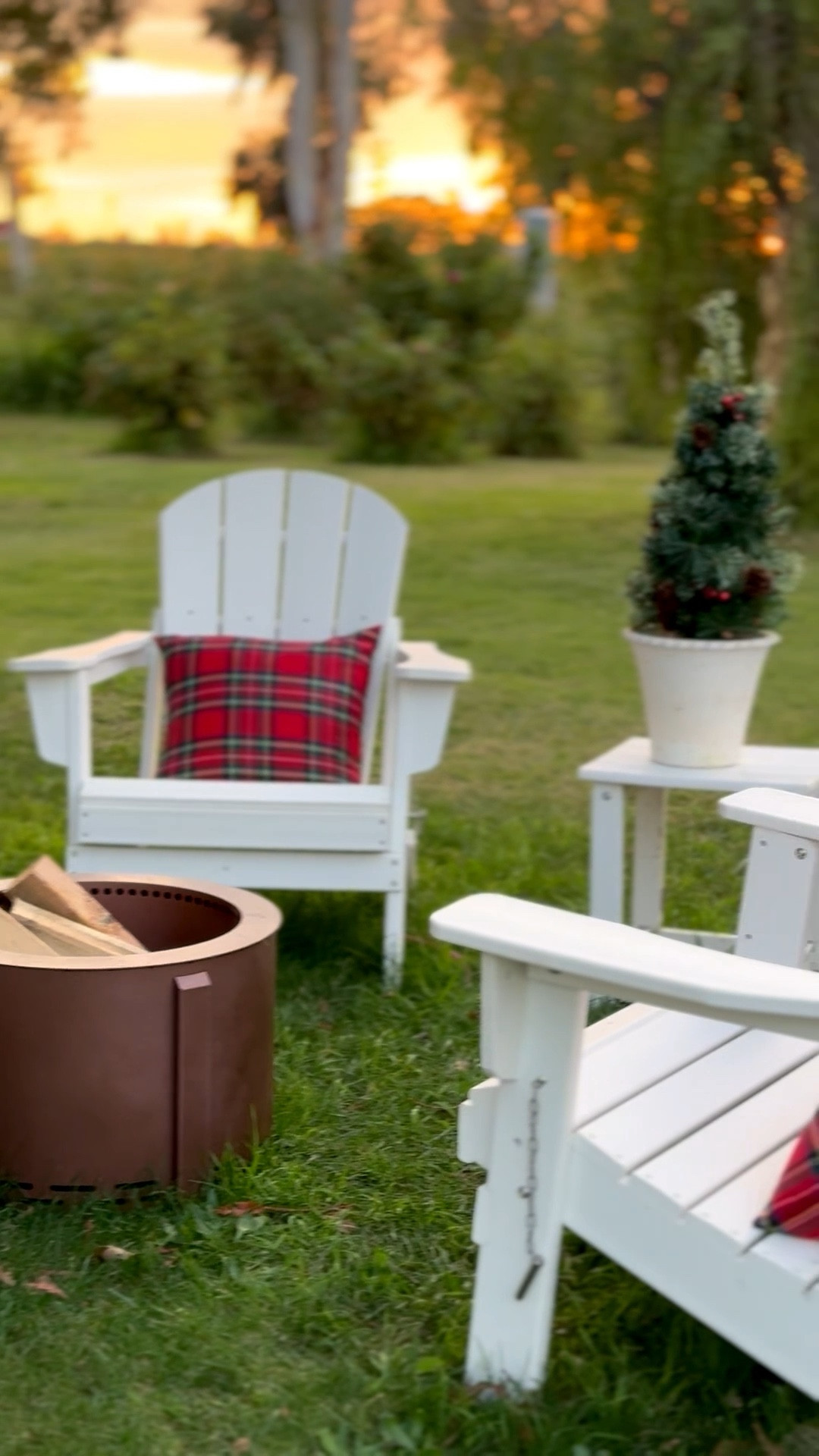 Gorgeous holiday fire pit setting just in time for Christmas! @wayfair has everything you need - from classic chairs, holiday inspired pillows, fire pits, Christmas trees and more! #wayfair #wayfairpartner 

#LTKParties #LTKHoliday #LTKHome