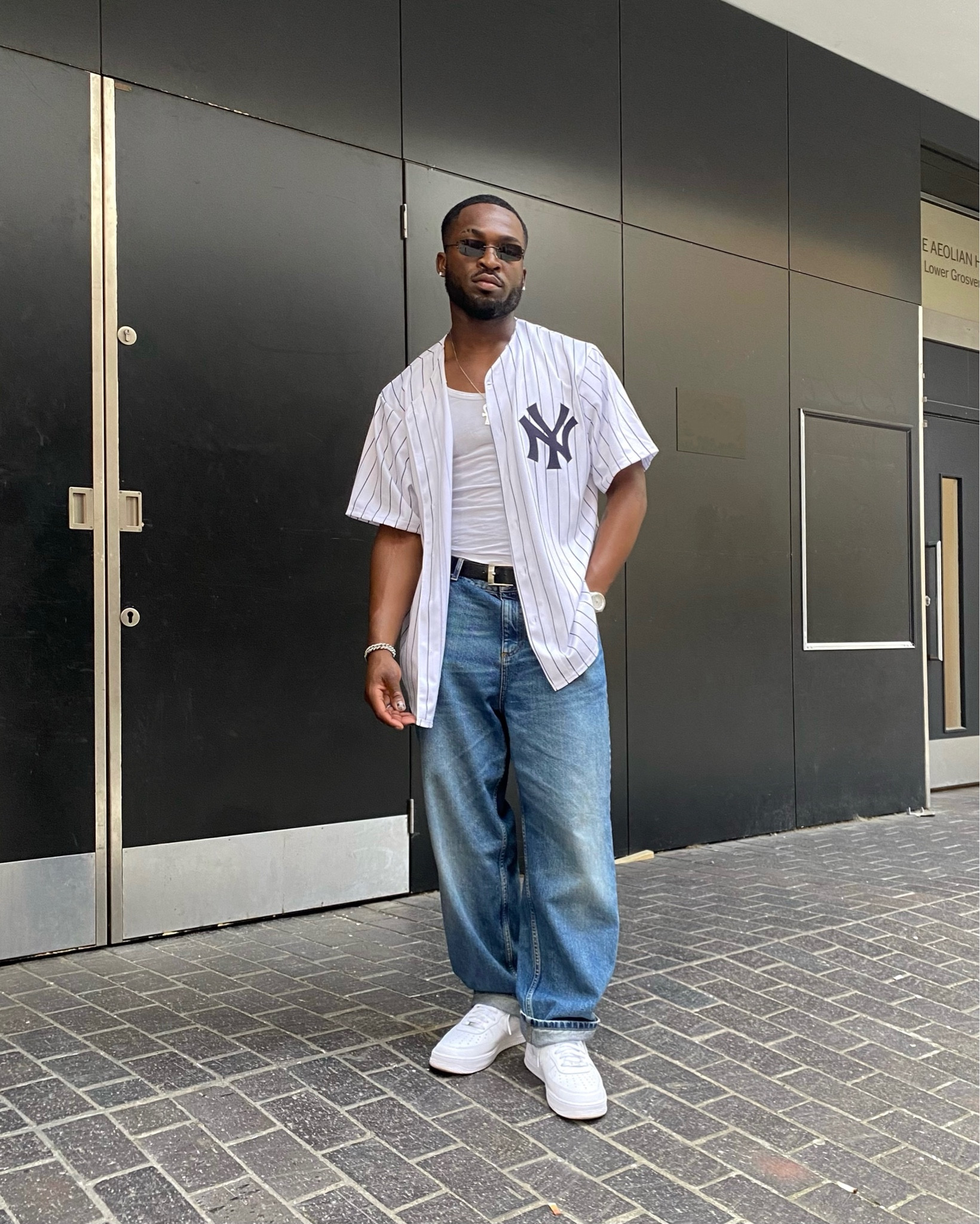 Yankees jersey, white vest, washed wide leg jeans, white air forces, brown men’s sunglasses, men’s fashion, style inspo, new era, Levi’s, Amazon 

#LTKmens #LTKstyletip #LTKeurope