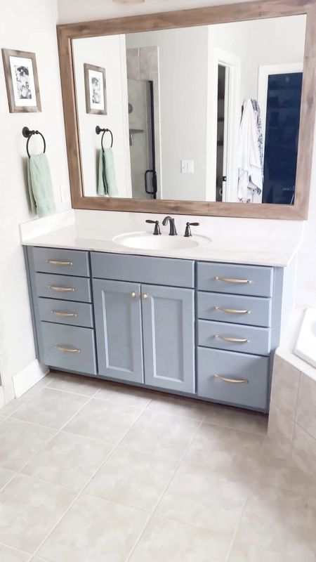 It’s all in the details. Tour my master bathroom remodel with me! Loving this hardware, the floor tiles and all the accents that just complete this room!

Bathroom remodel | bathroom decor | master bathroom | farmhouse bathroom | bathroom refresh 

#LTKfindsunder100 #LTKVideo #LTKfindsunder50