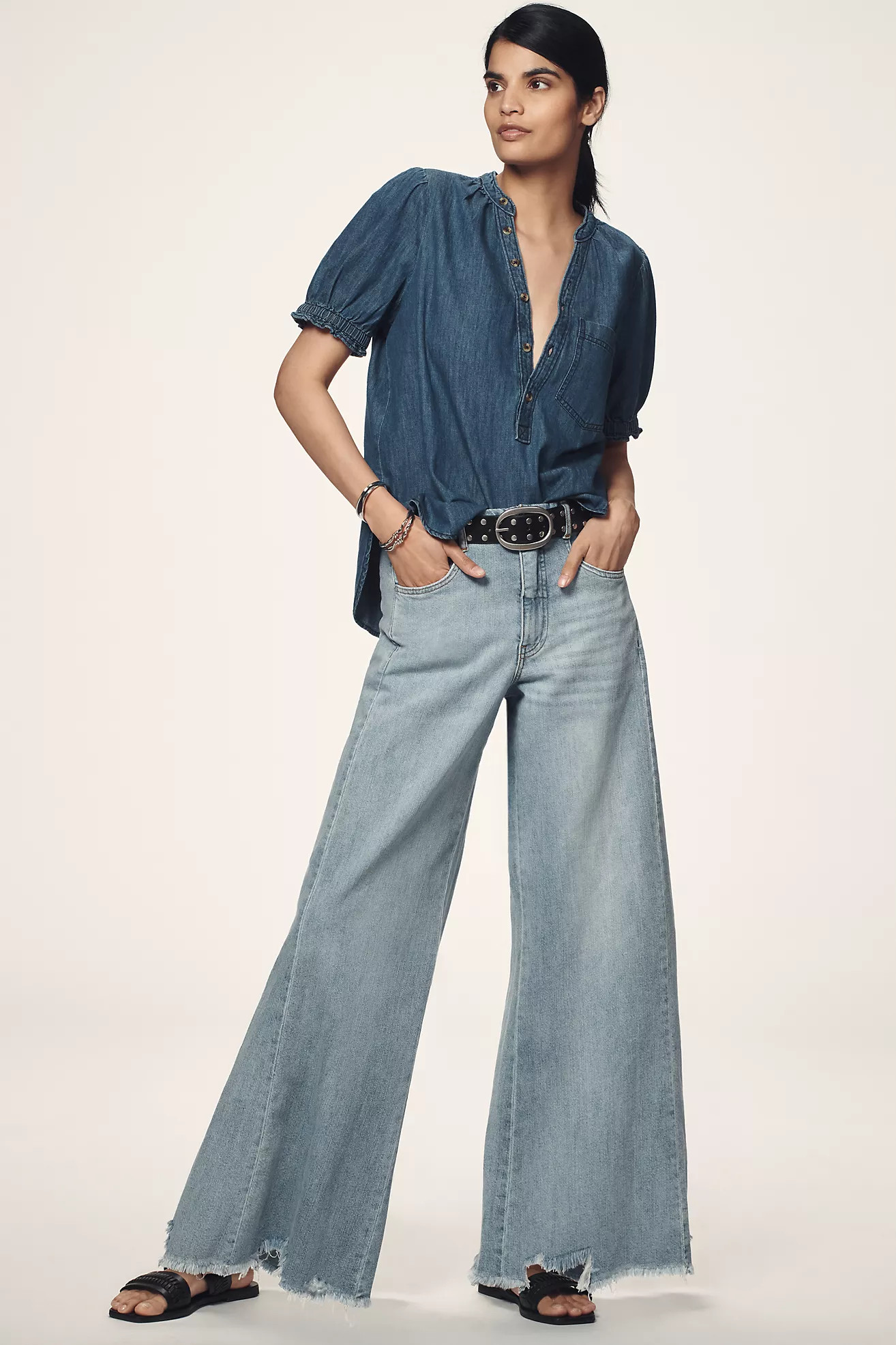 The Adi Regenerative Cotton Mid-Rise Frayed Relaxed Flare Jeans by Pilcro | Anthropologie (US)