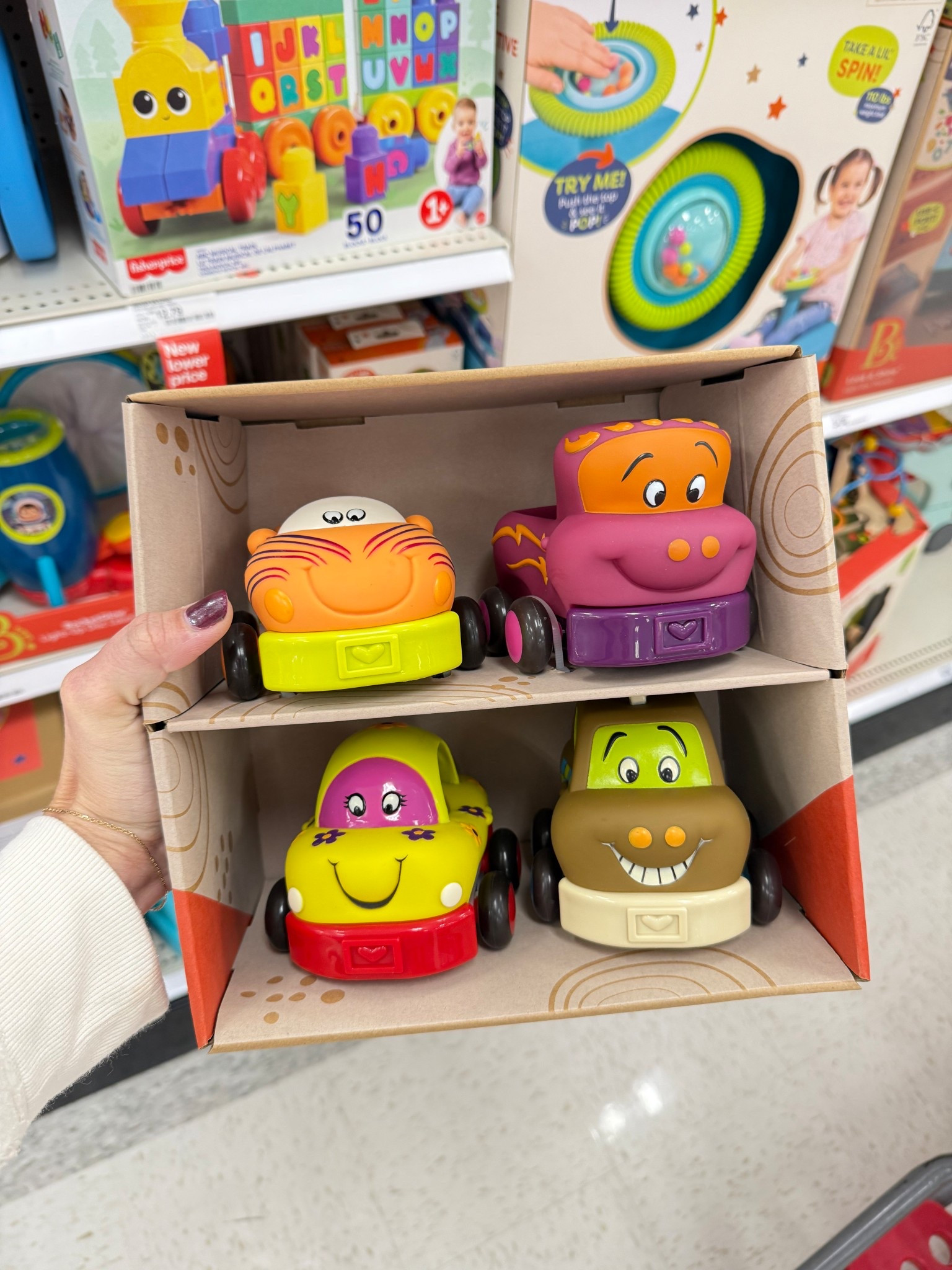 B. Toys 4 Pull-Back Toy Vehicles - Wheeee-ls!: Fine Motor Skills, Sound Effects, Plastic, Non-Powered

#LTKKids #LTKGiftGuide #LTKHoliday