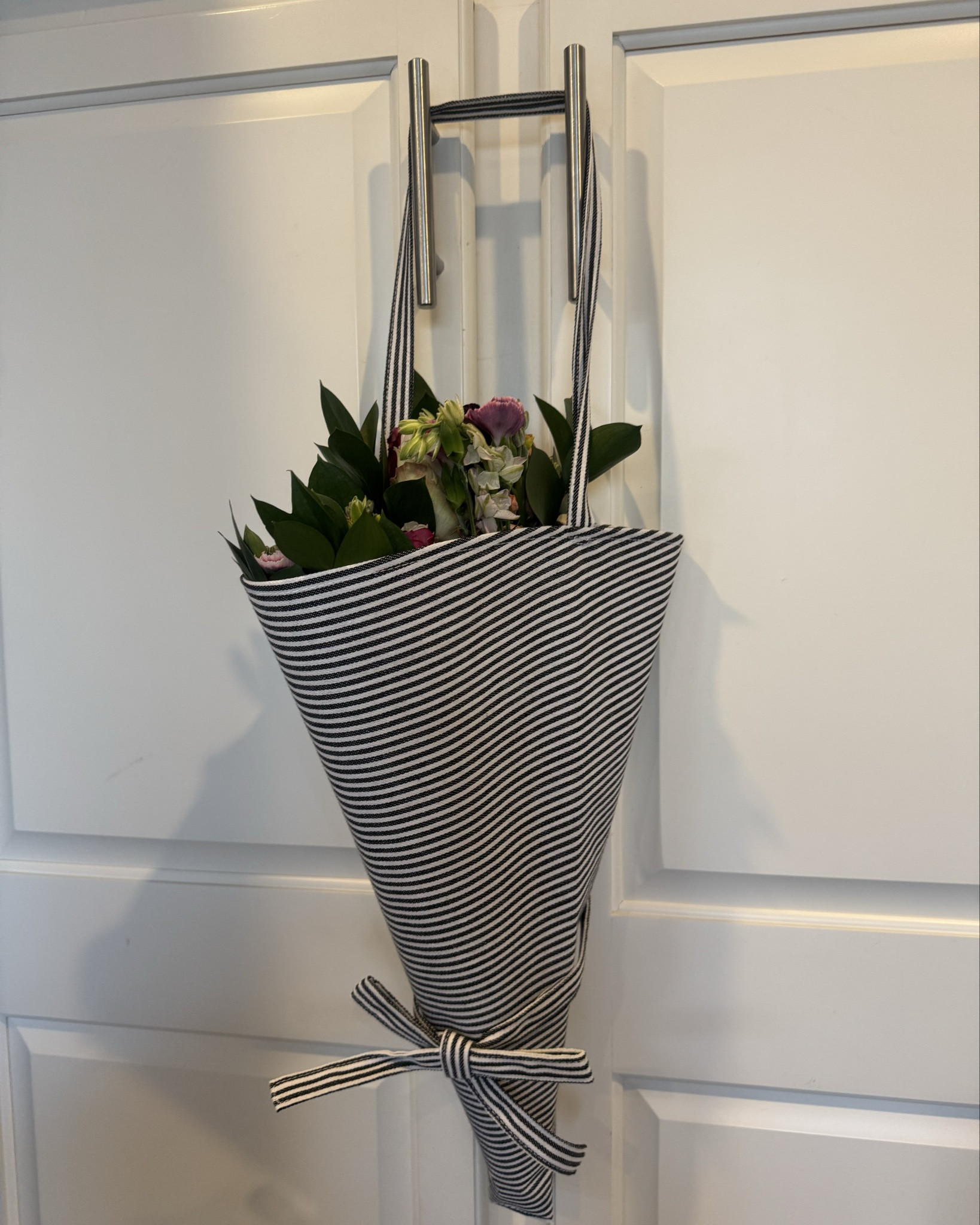 Love a flower market tote moment 💐

Such a pretty and unexpected find at such an affordable price. Perfect for grocery store flowers or these gorgeous ones from the bouqs co. (Pretty in Purple)

Makes flowers easy to take home, hang off your cart so they don’t get crushed by groceries and just  so pretty in general. I could also see this being a perfect Valentine’s Day or Mother’s Day gift (with flowers inside of course)! 🌷🌻🌹

#LTKHome #LTKGiftGuide #LTKFindsUnder50