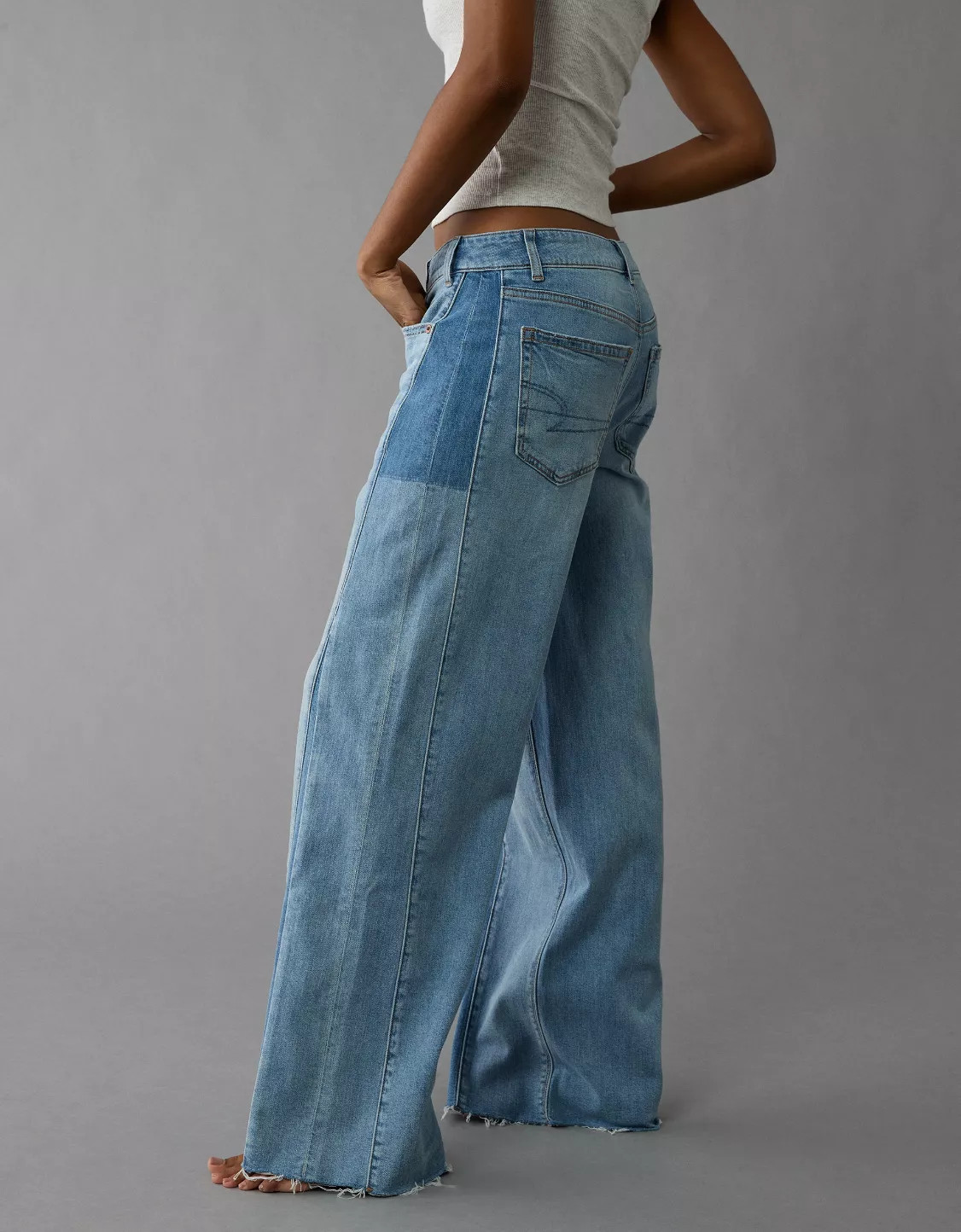 AE Dreamy Drape Stretch Patchwork Low-Rise Baggy Wide-Leg Jean | American Eagle Outfitters (US & CA)