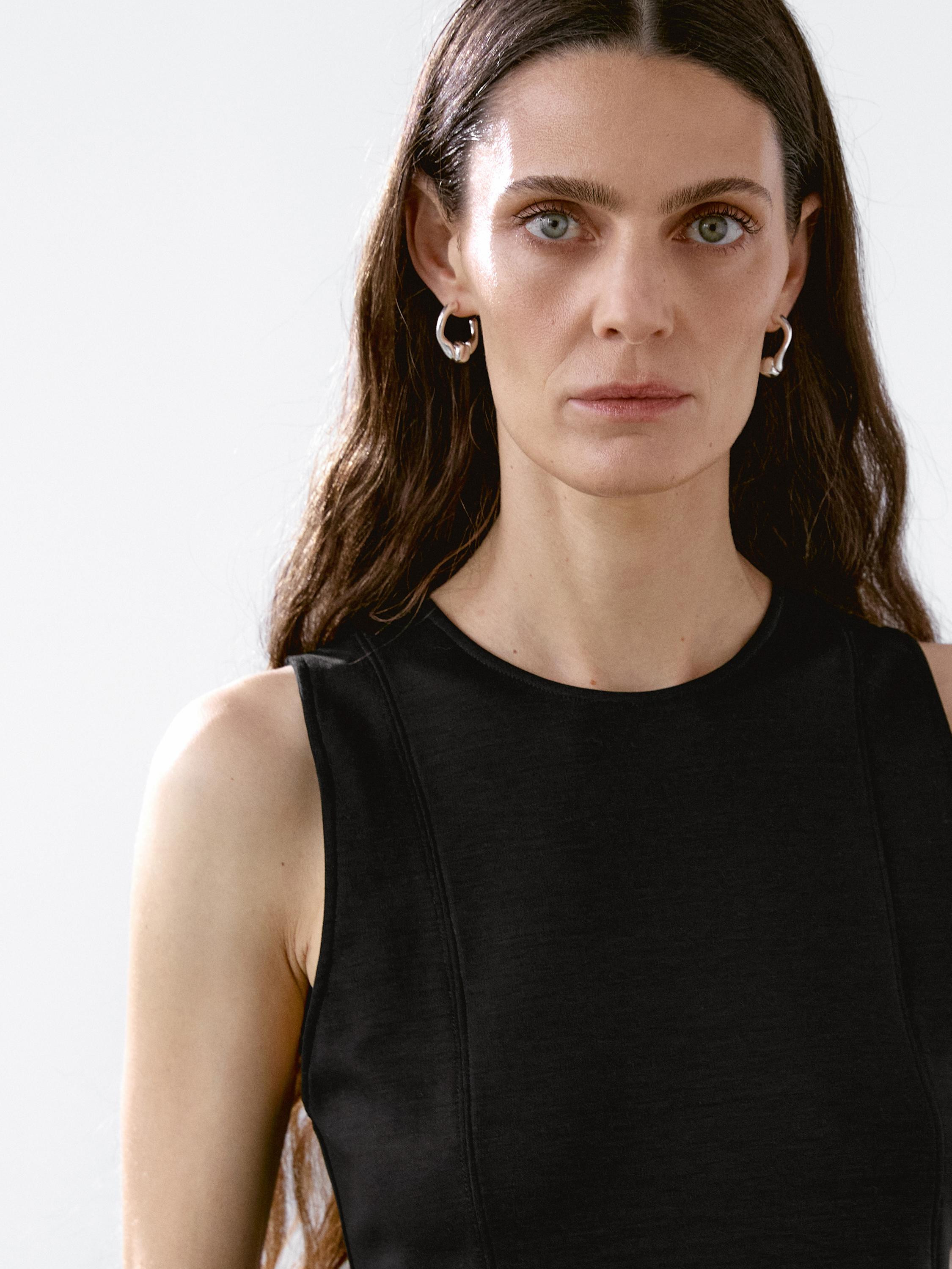 Halter neck top . Crew neck. Peplum. Seam details . This garment is longer than usual.. | Massimo Dutti UK
