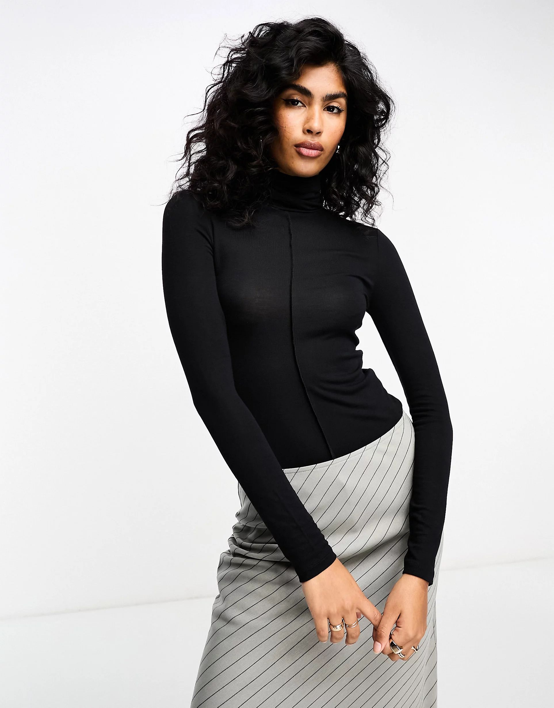 ASOS DESIGN fine knit exposed seam roll neck bodysuit in black | ASOS (Global)
