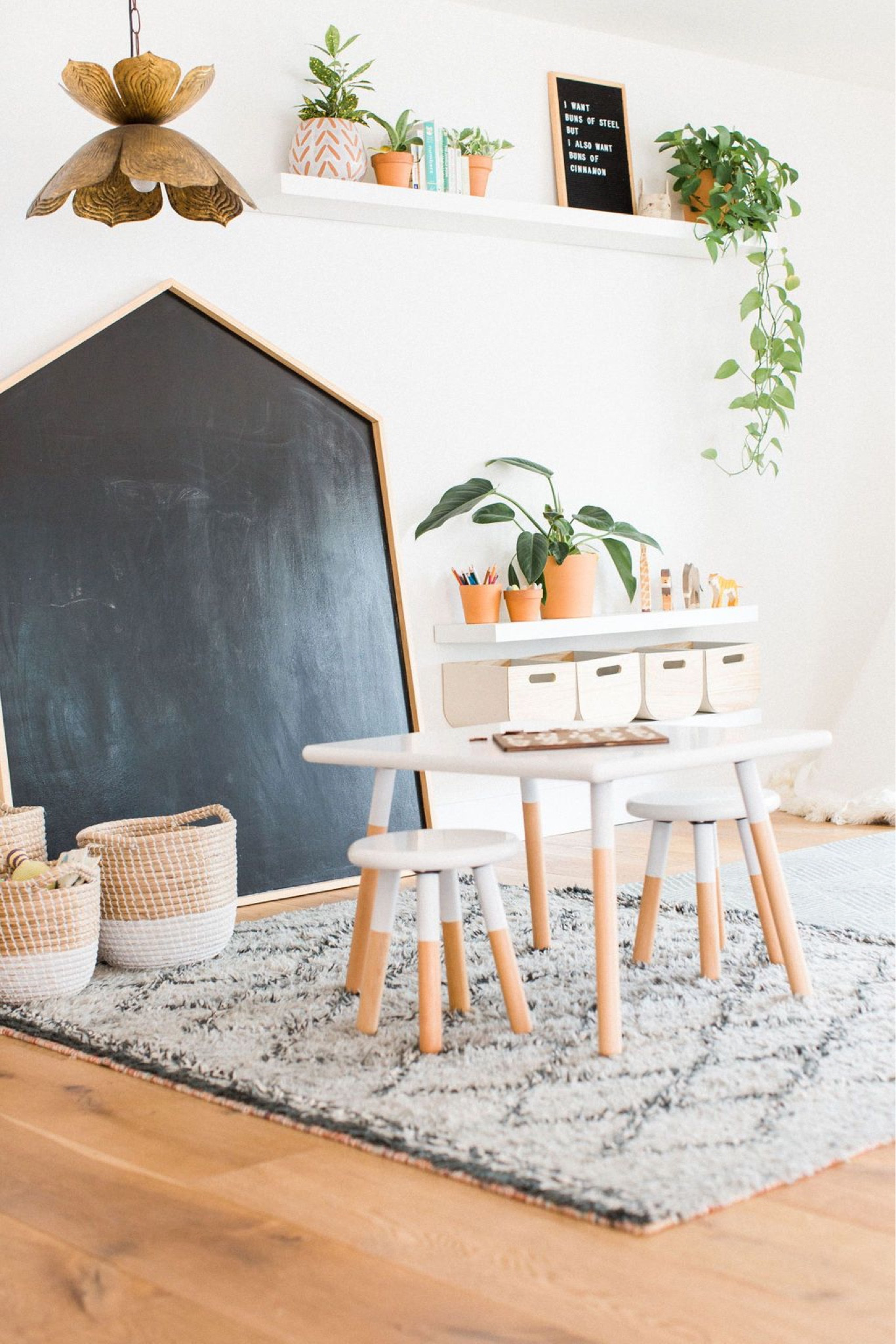 Fun, creative kids space.

Kids table and stool set, house shaped chalkboard, floating shelves, lotus pendant, nesting baskets, wood storage bins, felt letter board, area rug, wooden animal figurines.

Kids space, kids storage, play space, kids playroom, children’s space, brass pendant, kids table, toy storage, wooden toys, toddler playroom, playroom decor, opening shelving, storage bins. 

#LTKhome #LTKfamily #LTKkids