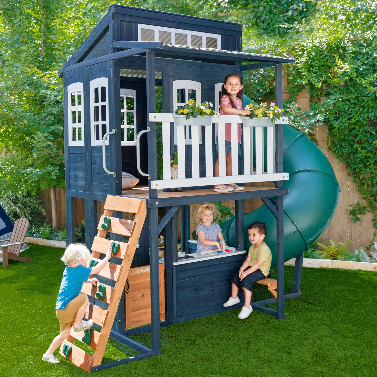 Cozy Escape Wooden Outdoor Two-Story Playhouse with Tube Slide, Kitchen, Rock Wall and Bench - Na... | Wayfair North America
