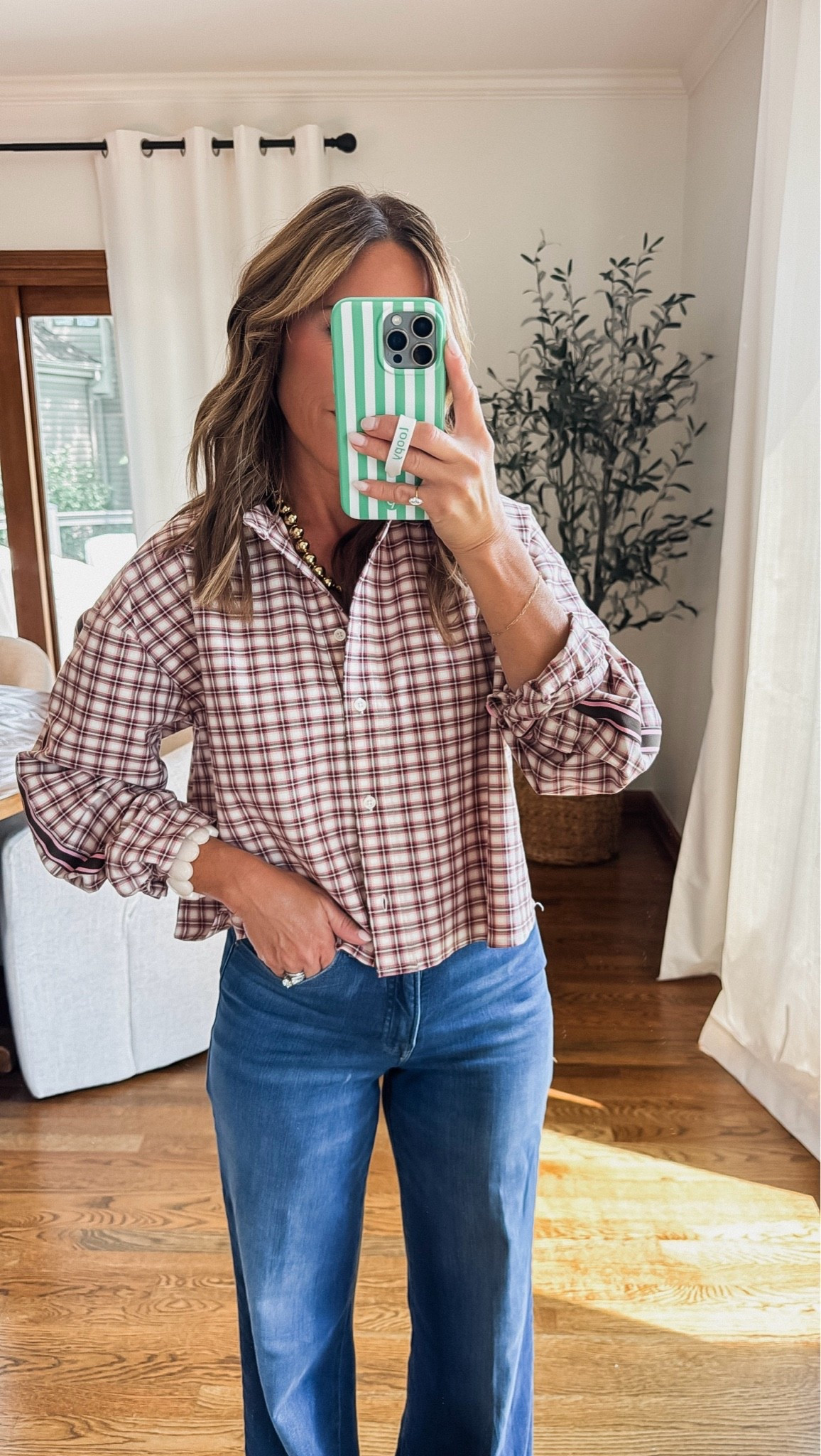 A fun plaid top. Love the stripe ribbon down the sleeve. 
Small here. Stay tts for a more fitted look.

#LTKmomlife #LTKSeasonal #LTKOver40