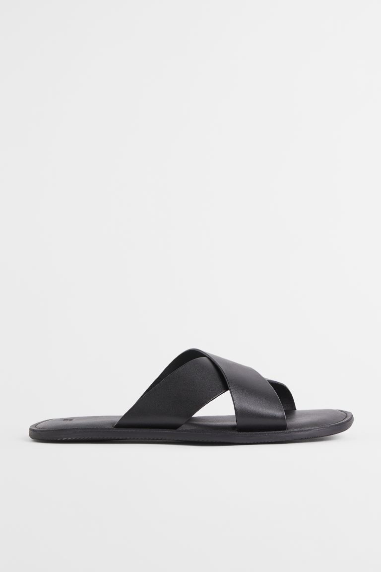 Premium SelectionSlides in soft leather with wide, crossover foot straps. Leather insoles and pat... | H&M (US + CA)