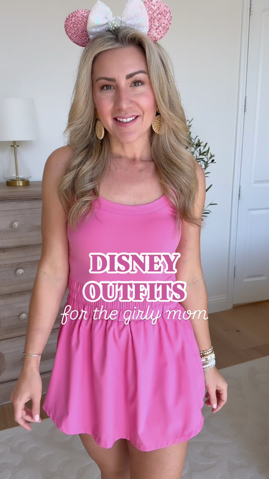 5 DISNEY OUTFITS for the girly mom, perfect for hot park days! 💗☀️🪄

FROM AMAZON: 
• Cute and comfy athletic dresses with shorts - so easy to throw on and super lightweight! Wearing small in all 3 styles!
• Belt bags and pearl patches (Minnie and ABC letters) - SO easy to peel and stick these patches right onto the bags, no ironing needed!
• Sequin Minnie ear headbands and metallic backpack/crossbody bag - both come in a TON of colors 🫶🏼 
• White tank with built-in bra and nude tennis skort - wearing medium in both pieces

FROM ETSY:
• Princess graphic tee 👑 comes in adult and youth sizes so you can match with your girl(s)! 

#disneyoutfits #disneymom #disneymomoutfits #disneystyle #disneyfashion #amazondisneyoutfits #athleticdresses #tennisdresses #tennisskort #amazondresses #athleticwear #comfyoutfits #comfystyle #girlmom #matchingdisneyoutfits #matchingdisneyshirts #disneybeltbag #disneybag #disneylooks #minnieheadband #funmomoutfits #colorfulstyle #pinkdress #disneyprincess #disneyvacation #disneypacking 

#LTKActive #LTKStyleTip #LTKFindsUnder50