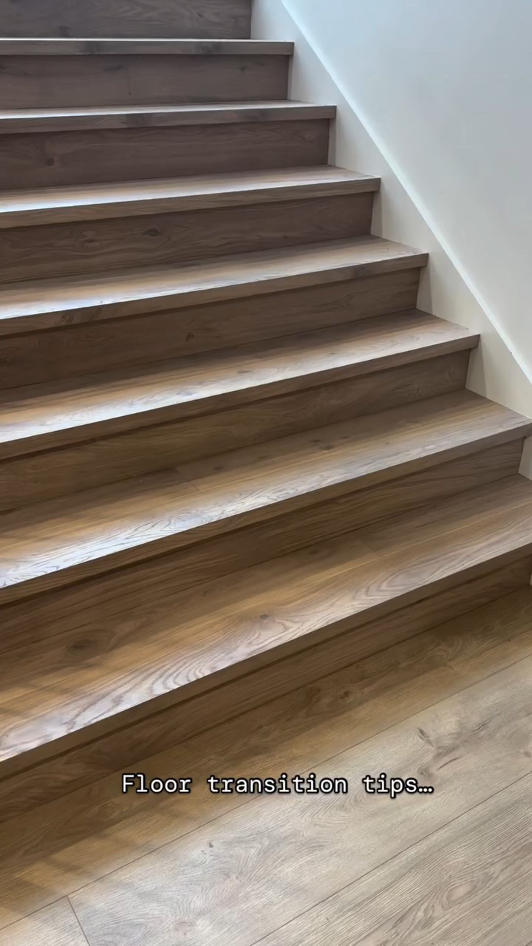 Save for later: how can I transition from wood to LVT? Here’s a transition from wood (on the stairs) to the LVT in the basement floor. It’s a pretty close match and it’s hard to tell the difference. LVT is a great choice for basements where wood is not recommended.

LVT: Trucor Tymbr in Madrid 
Engineered hardwood: Coswick in Vanilla
 
#woodfloors #woodflooring #lvt #basement #basementapproved #stairs #staircase #woodstairs #floor #flooring #homereels #newbuild #modernhome #modernhomes #customhome #interiordesigners #whiteoak #whiteoakfloors #neutralstyle #modernhomedecor #designbuild #mydomaine #interiordesignideas #interiordesigners #stairdesign
