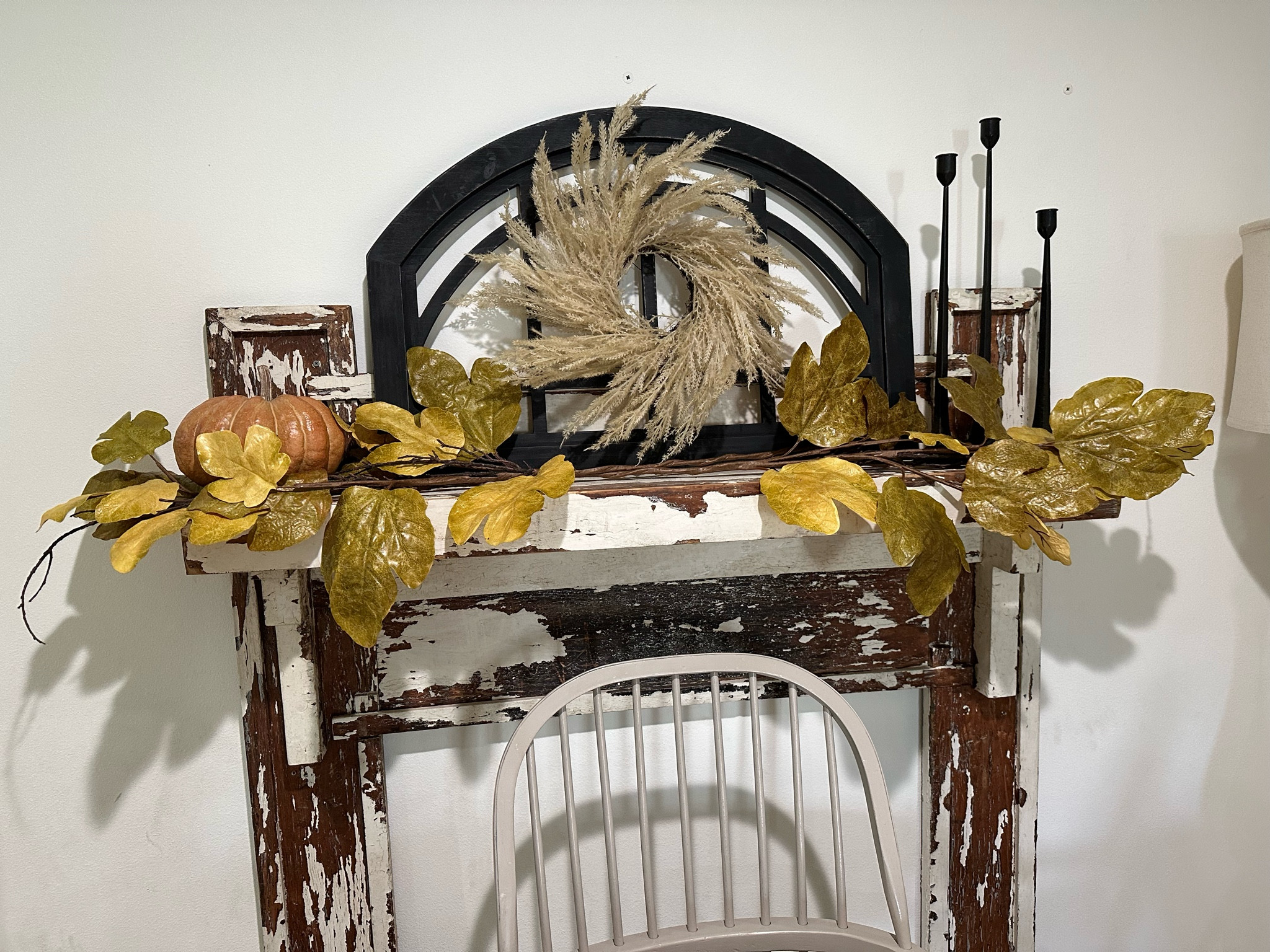 Here is my simple fall mantle, I love the contrast of the black with the fall colors, fall mantle decor, fall decor, fall home decor, fall leaves, fall stems, fall wreath, realistic fake pumpkins, fall pumpkins

#LTKstyletip #LTKSeasonal #LTKhome