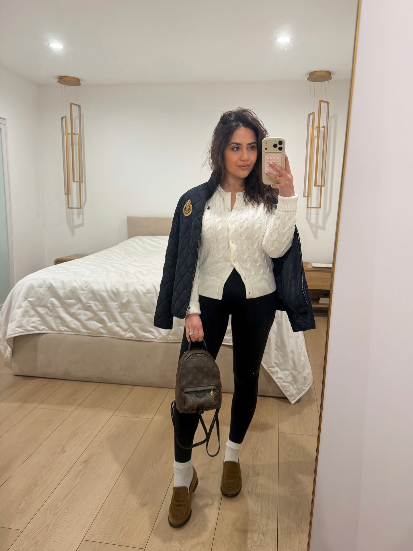 Effortless, polished, and endlessly wearable 🤍
A cozy cable-knit cardigan from Ralph Lauren paired with sleek black leggings for that elevated off-duty feel. Layered with a Ralph Lauren quilted jacket for structure, finished with classic loafers, cozy crew socks, and a LV Palm Springs Mini to pull it all together. Perfect for casual errands, travel days, or chic everyday wear when you want comfort without sacrificing style.


#LTKSeasonal #LTKgrwm #LTKootd