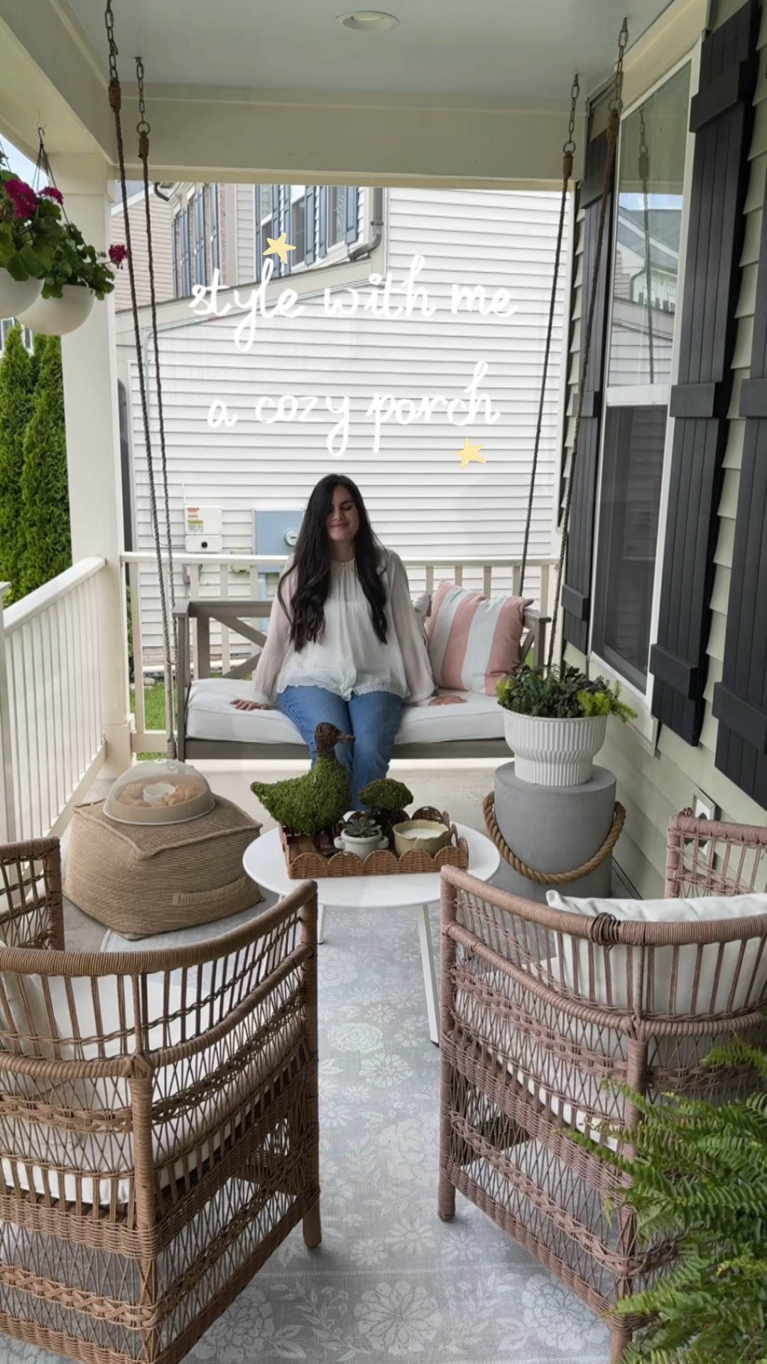 Style with me - a cozy front porch! 🤎 

Details are below:

- Swing: old from Walmart (discontinued, linked similar)

- Rug: Ruggable (exact one linked)

- Wicker Chairs: old from Target (linked similar)

- White coffee table: Amazon (exact one linked)

- Outdoor pouf/ottoman: old from Target (similar linked)

- Concrete side table: old from World Market (similar linked)

All other decorations are from pOpshelf (cannot link here, but linked all the similar versions I was able to find) ☺️