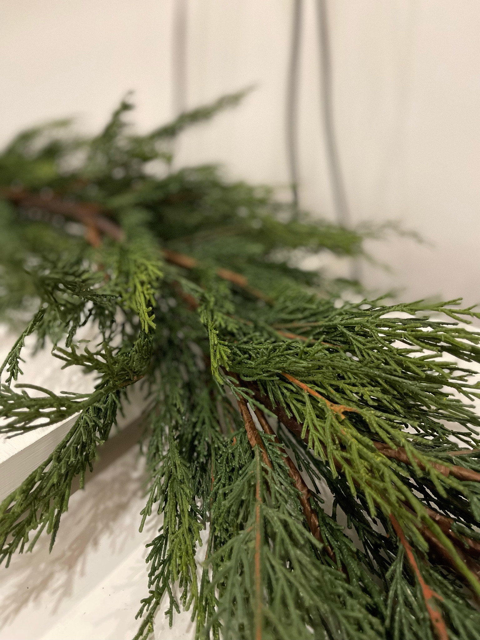 Highly recommend investing in a good quality garland. I have two of these ones from crate and barrel! They’re so realistic looking and can be paired with a more inexpensive one for a fuller look! 

It sells out every year but is currently in stock AND ships free! 

#LTKHoliday #LTKSeasonal #LTKHome