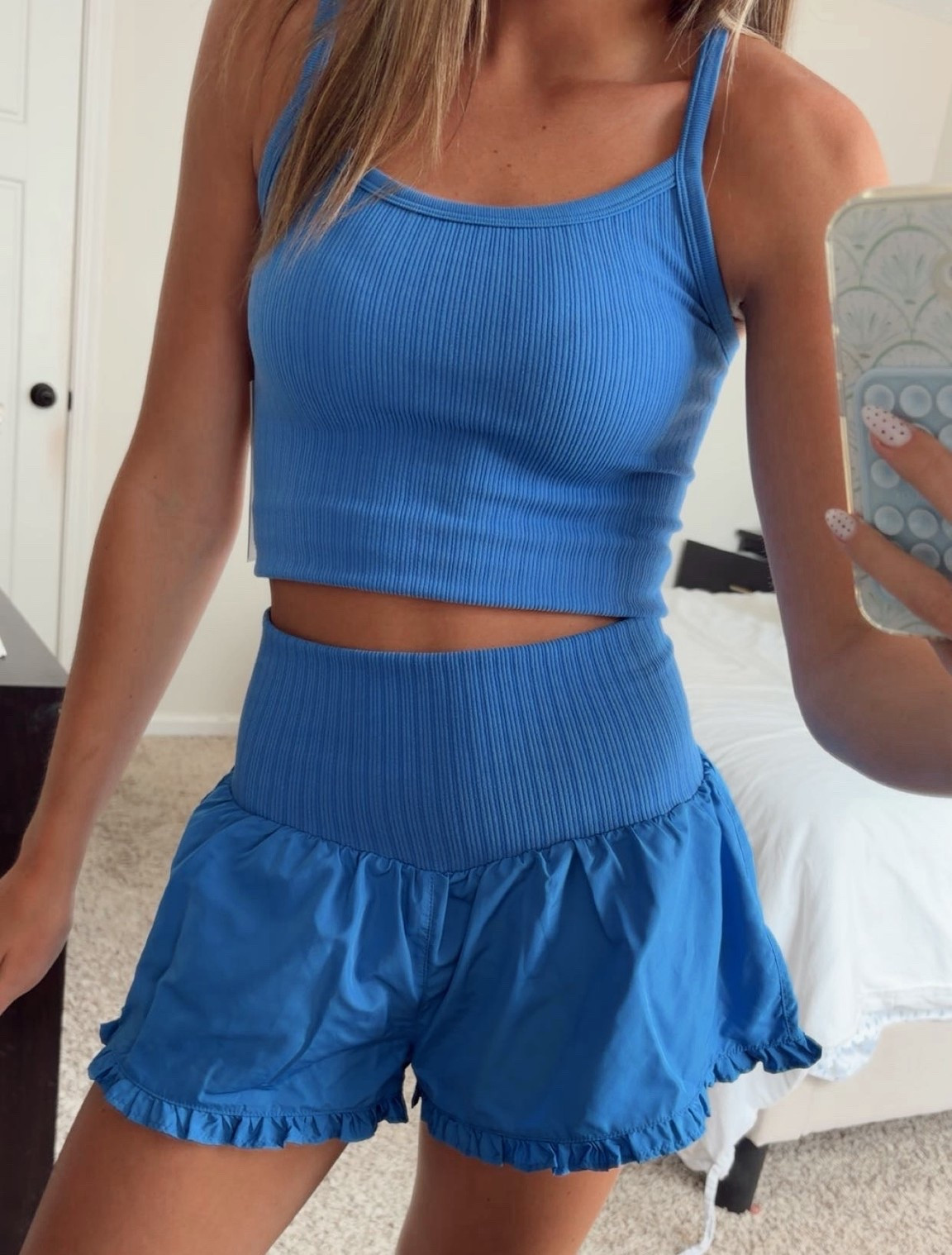 cant post this set enough! Walmarts best seller set right now, the activewear set dupe! Its so affordable and has reat quality, for the whole set being $15! you cant beat that, and Walmart always has the best deals! I am wearing the blue version, but it comes in black, pink, and red as well. The sizing ranges xxs-xxl! I am wearing both in an xs, I would recommend trying your normal size, and sizing down, the sets tend to stretch out a little throughout the day while wearing. The fabric is the softest thing ever, and very light and movable. If this doesn't convince you to get yourself this set, I don't know what will, you need this!! Perfect for all the summer occasions and beyond cute 

 #LTKWalmart #walmartfinds #ootd #matchingset #LTKactivewearset #summerstyle #pickleballoutfit #LTKootd #LTKfitnessgoals #LTKActive