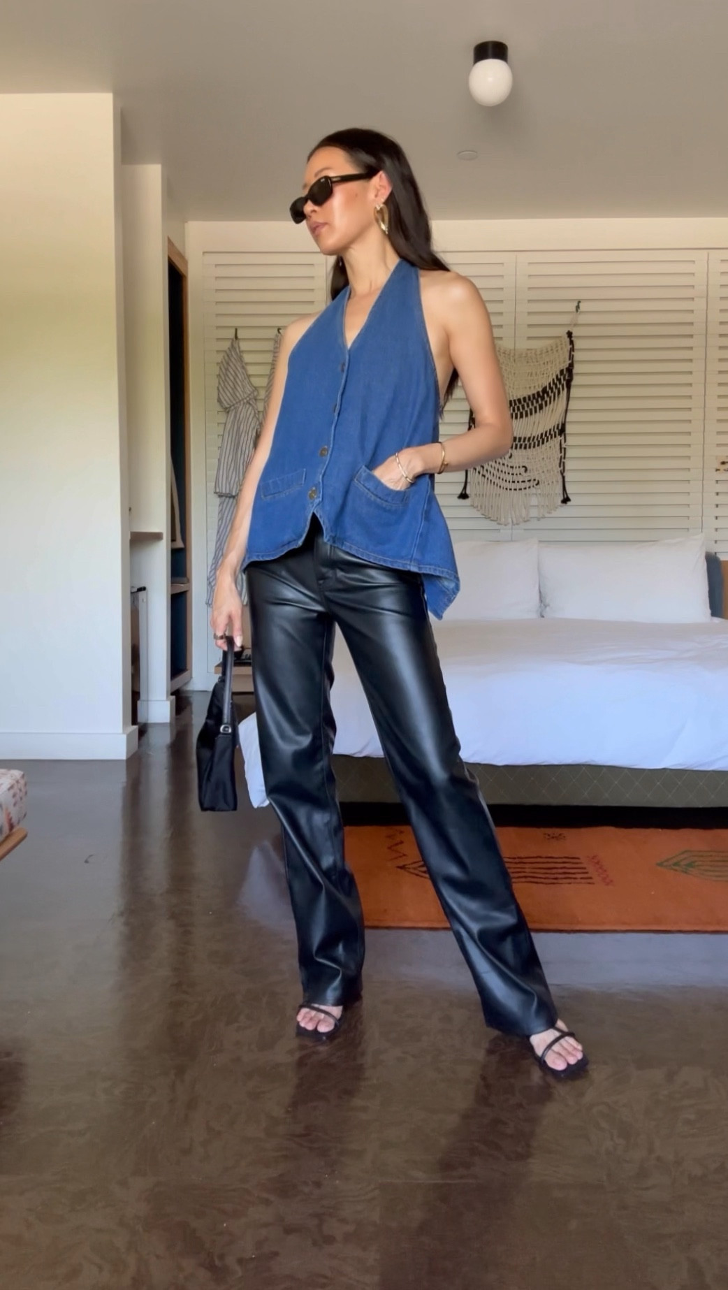 Denim and faux leather combo that makes a statement for a night out! Loving this under $80 halter style, apron top that comes in 3 colors. Pair it with faux leather, high waisted pants that are so good. Comes in 4 colors for the perfect fall look.

Wearing a xxs in top (runs large) and pants are in a 24 (runs tts). Trust me this top will get you all the compliments! 

#LTKVideo #LTKFindsUnder100 #LTKOver40