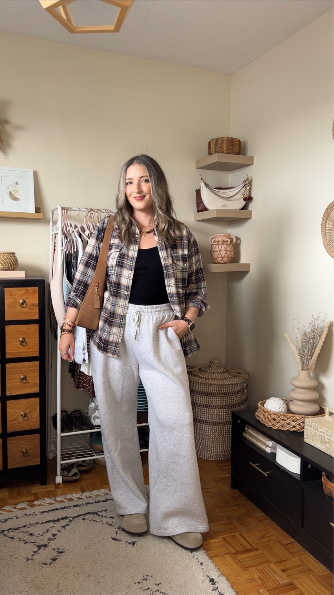 Comfy fall outfit idea! Sized up to XL in the plaid flannel shirt for an oversized fit. Wearing L in the tank top but should have done M (exact Canadian tank link under “similar products”) Wearing L in the wide leg sweatpants. I’m a 9.5-10 shoe and wear a 40 in the Birkenstock Bostons

#LTKfall #LTKmidsize #LTKsale