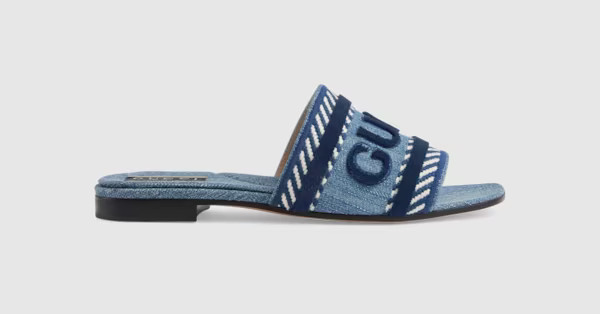 Gucci - Women's slide sandal with Gucci script | Gucci (US)