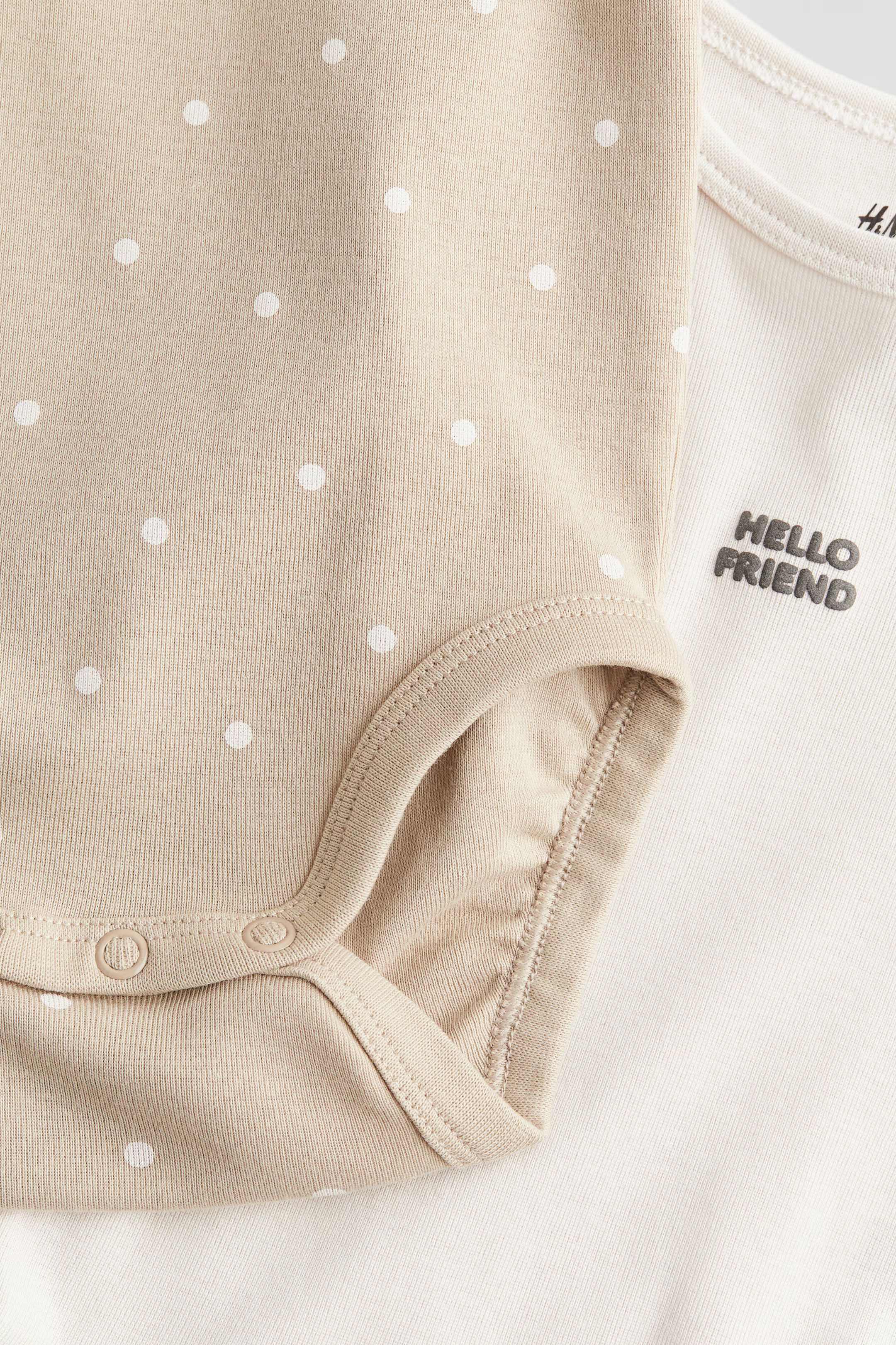 2er-Pack Langarmbodys - Langarm - Beige/Hello Friend - Kids | H&M AT | H&M (DE, AT, CH, NL, FI)