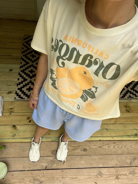 Graphic tee : wearing s // fits tts 
Shorts : wearing m // fit tts 
Sneakers : new balance 574 // size down .5 size 

Casual outfit // mom style // mom uniform // summer outfit // casual summer outfit 

#LTKunder50 #LTKSeasonal #LTKFind