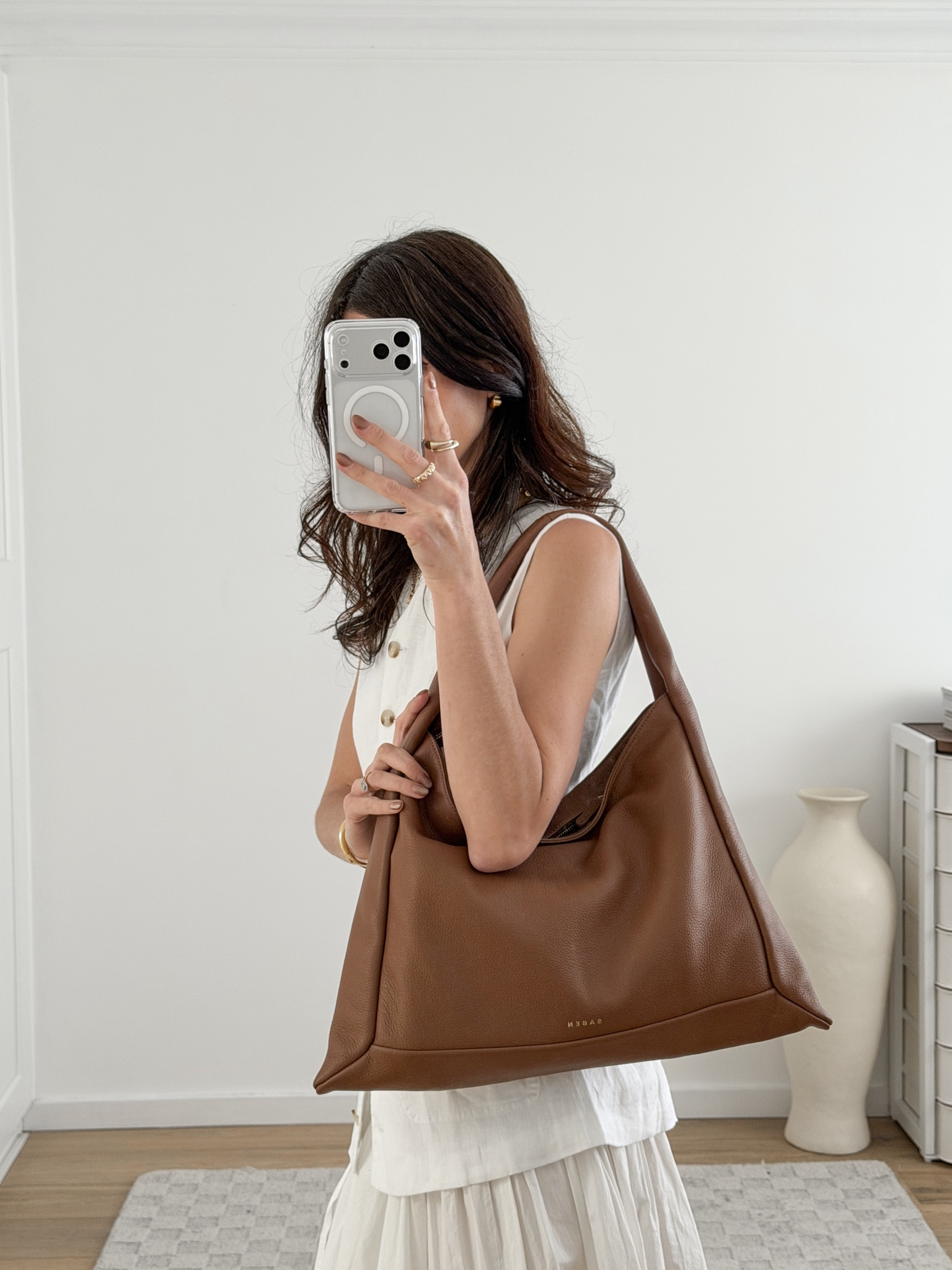 Shop it 15% off with JAMIE15

Literally didn’t think the Haze Bag from @sabenltd could get any better… but they’ve gone and launched it in their signature “tan” (the *perfect* neutral, if you ask me!) and had to share! 

She’s really roomy (can fit a laptop, and also passes the kids water bottle test x2!) but in the chicest, minimal silhouette - zip up closure for security, too 👌🏻