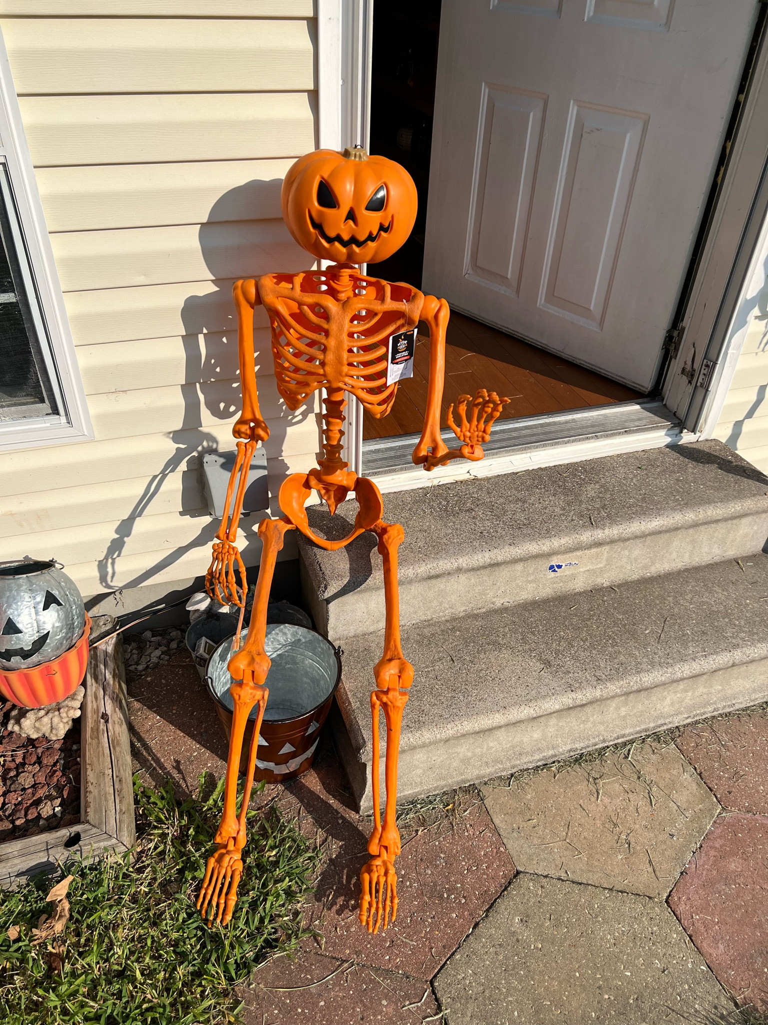 Target 60 inch poseable skeleton pumpkin! Hard to find for shipping but run to your local target or call ahead & ask if they have them in stock! 

#LTKunder50 #LTKHalloween #LTKhome