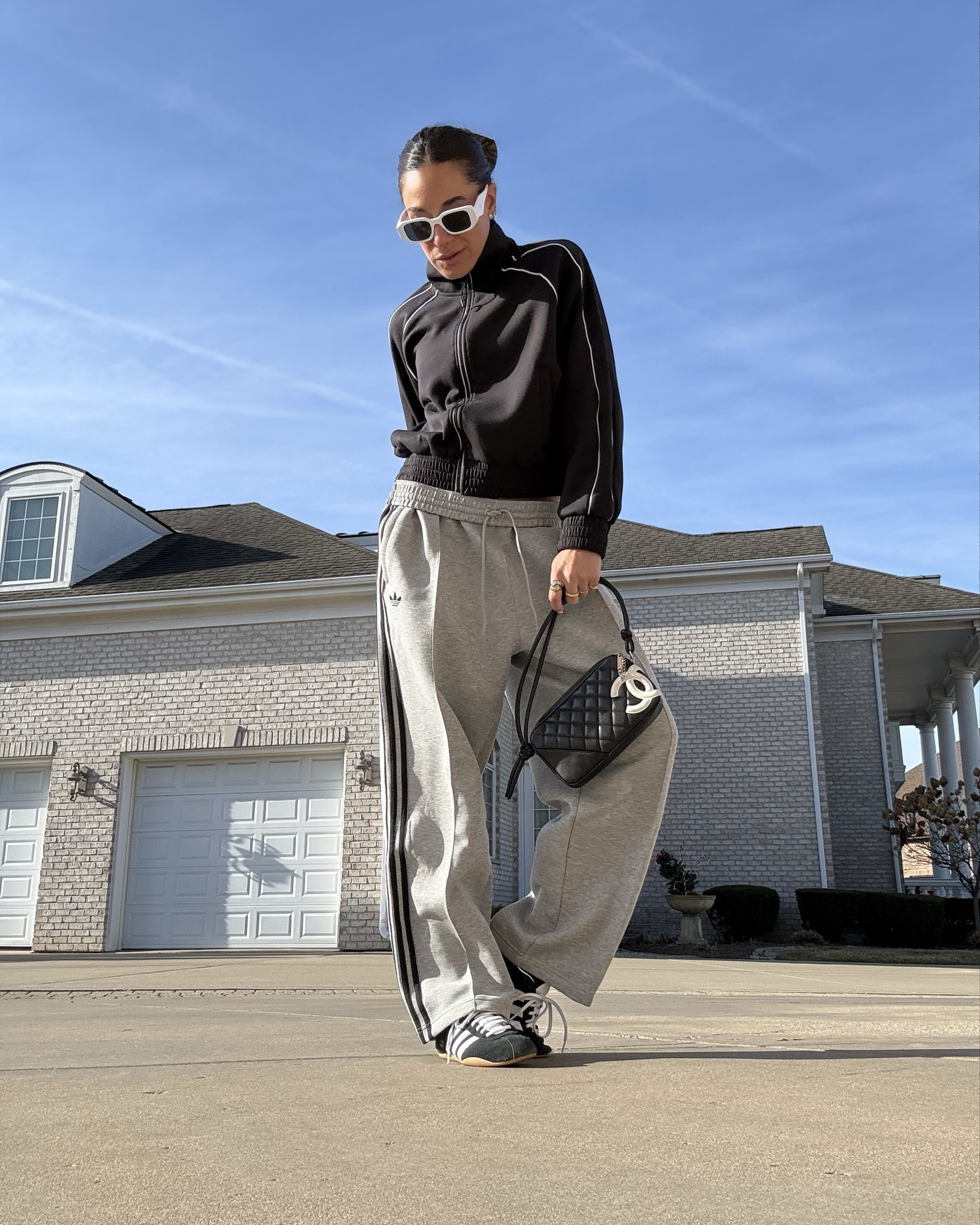 Off-duty but make it elevated 🖤
The comfiest wide-leg sweats + zip track jacket styled with a chic black bag and retro sneakers. 
Athleisure you can actually wear out of the house 👏🏼
Everything linked here ⬇️

#LTKootd #LTKSpringSale #LTKmomlife