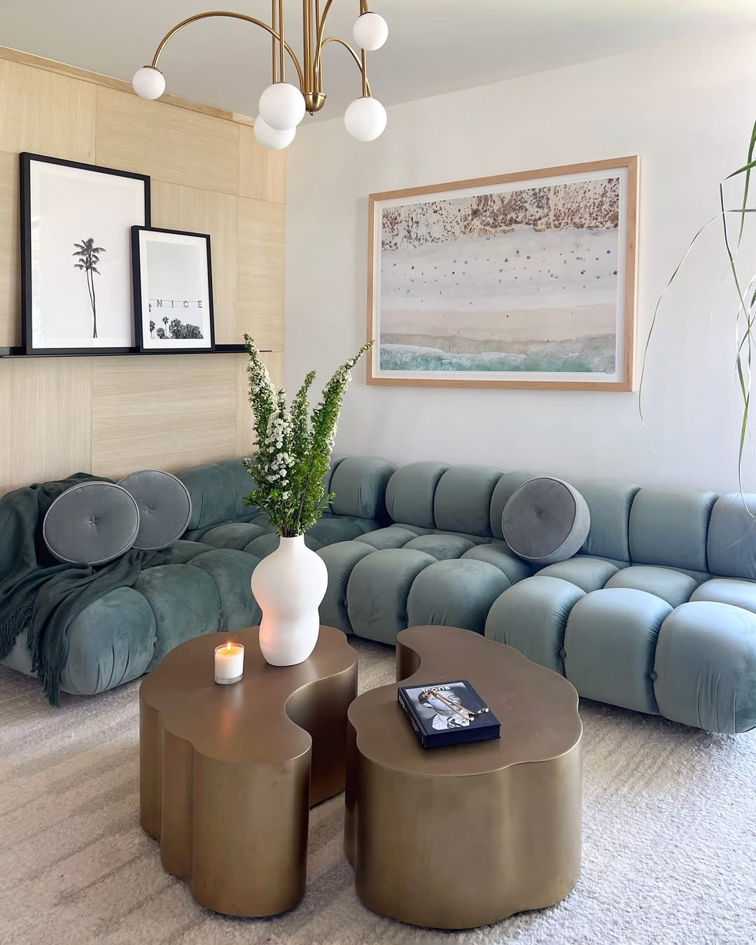 A cozy corner in the primary bedroom. Layered with plush blue velvet sofa, sculptural accents, and coastal prints for a refined, relaxed feel. Shop the Rove sofa , curved brass coffee table, and collected details below.

#BedroomSeatingArea  #OrganicModern
#LayeredInteriors
#CaliforniaCasual 

 

#LTKHome