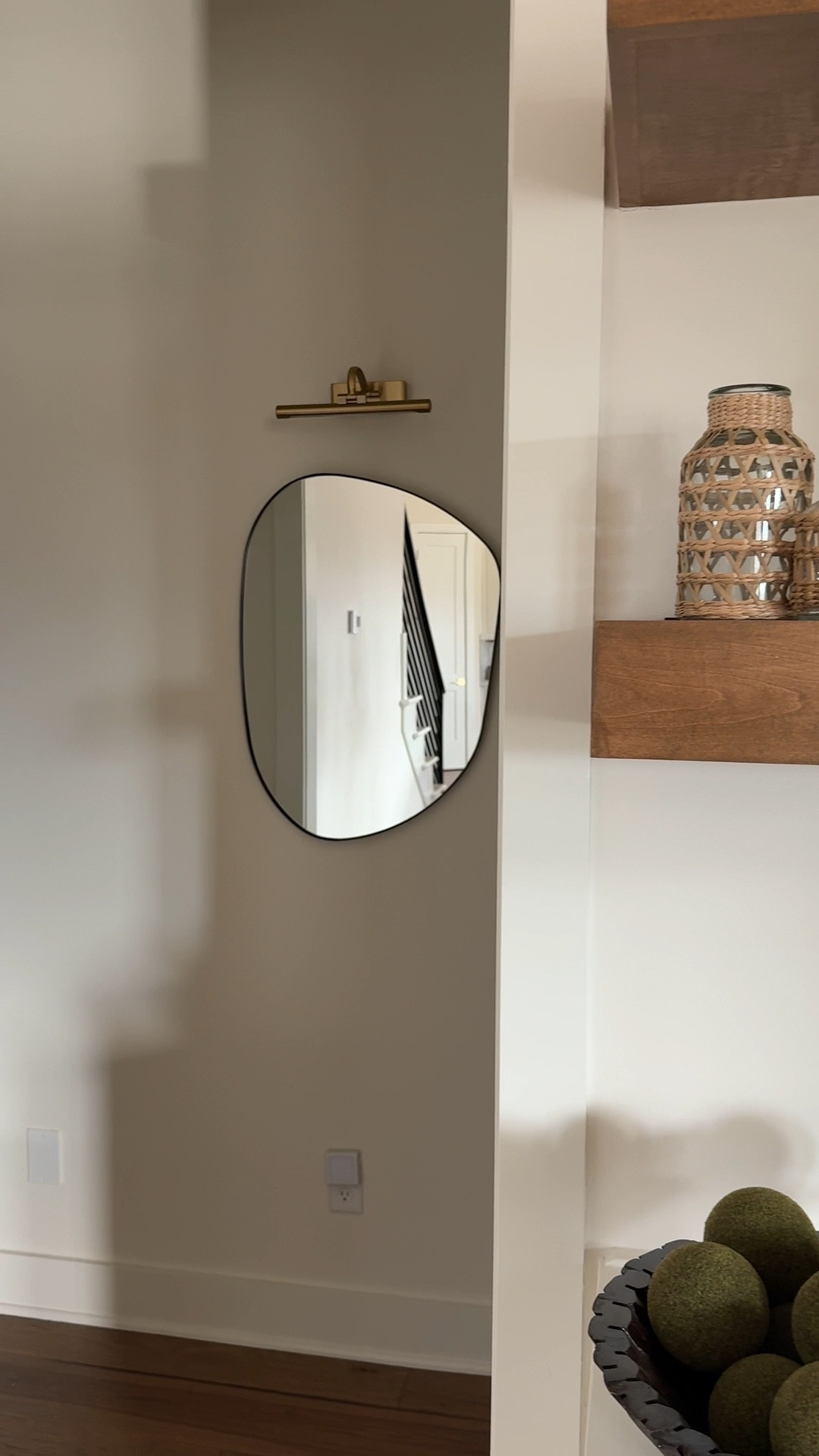 This little hallway moment finally feels finished after adding this mirror and picture light. Linking everything I used here!

#LTKHome #LTKSaleAlert