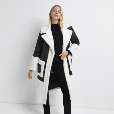 Black faux shearling oversized coat | River Island (UK & IE)