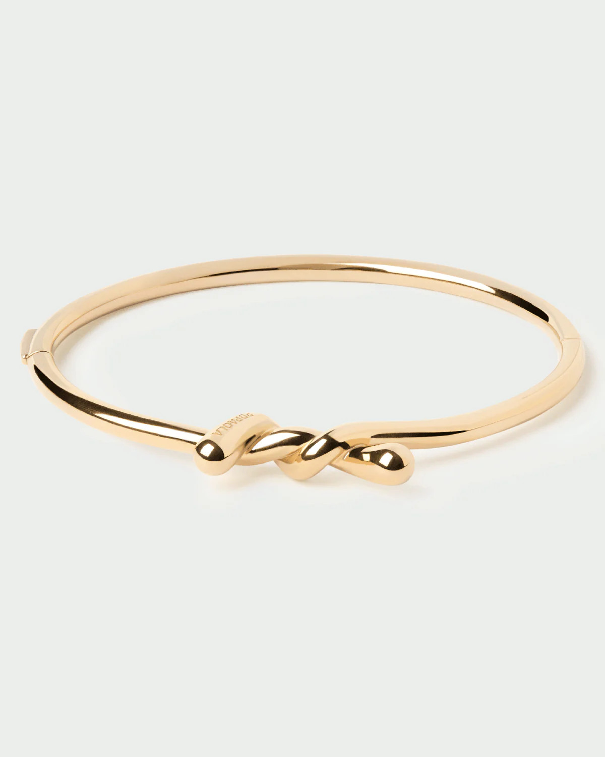 Gold-plated distinctive bangle with a fluid twisted motif | Twist bangle | PDPAOLA | PDPAOLA DE