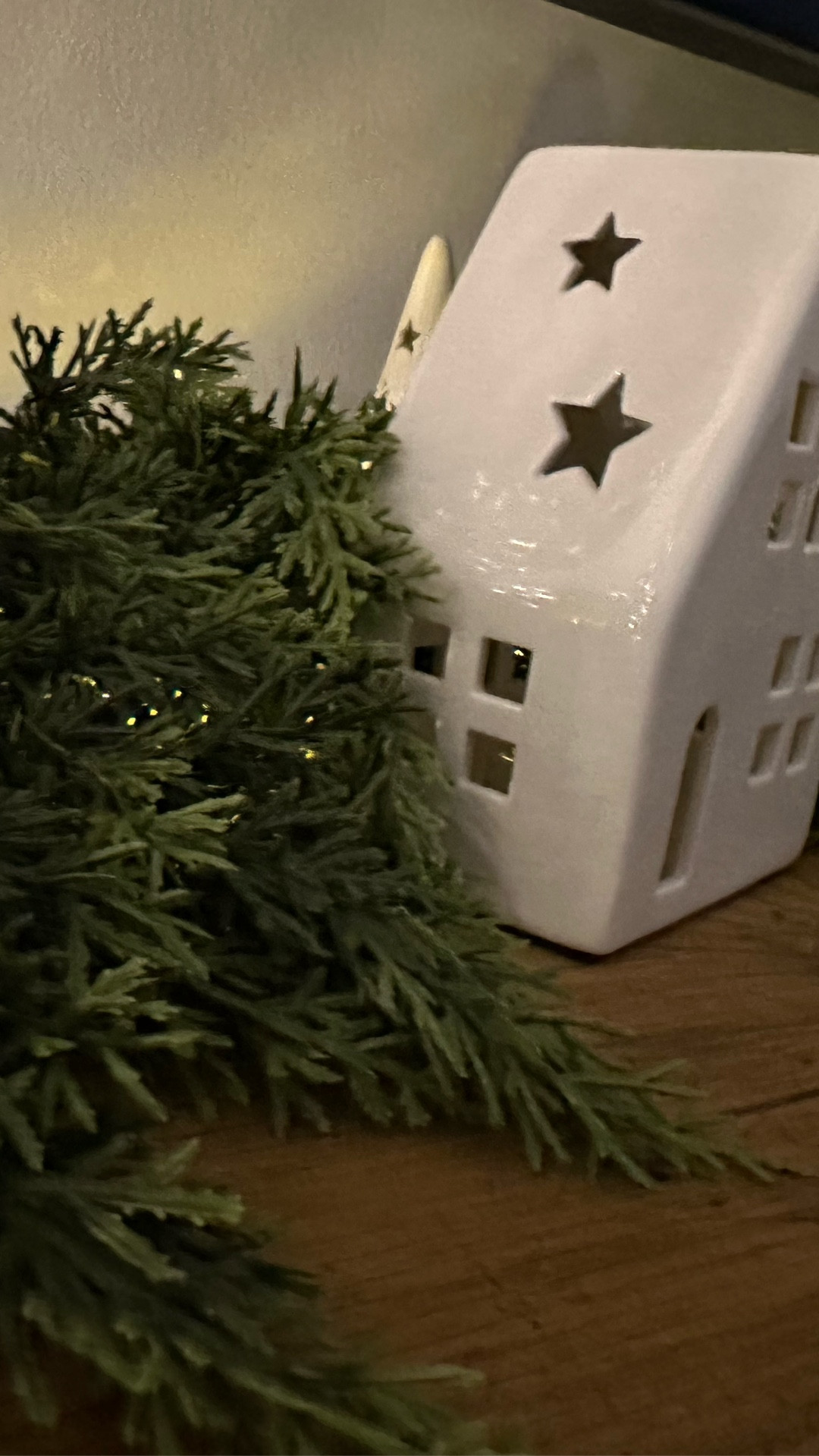 I love this Christmas garland! It looks real and I love how thick it is. Plus is has the battery operated lights! I always put these white ceramic houses and trees with it to add that little holiday feeling

#LTKHoliday #LTKHome #LTKSeasonal