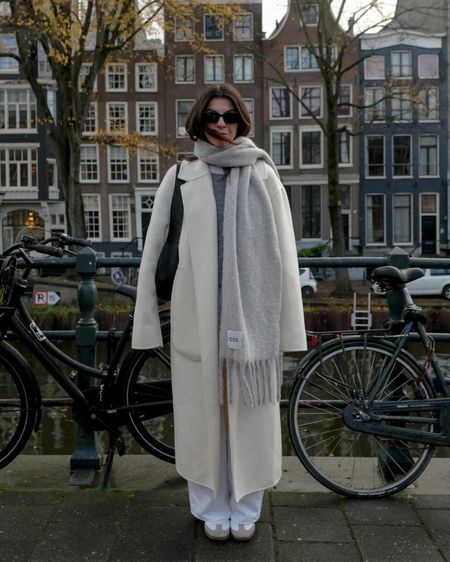 Long white coat, wool tassel scarf, white trainers samba, crossbody black bag

#LTKSeasonal #LTKeurope #LTKstyletip